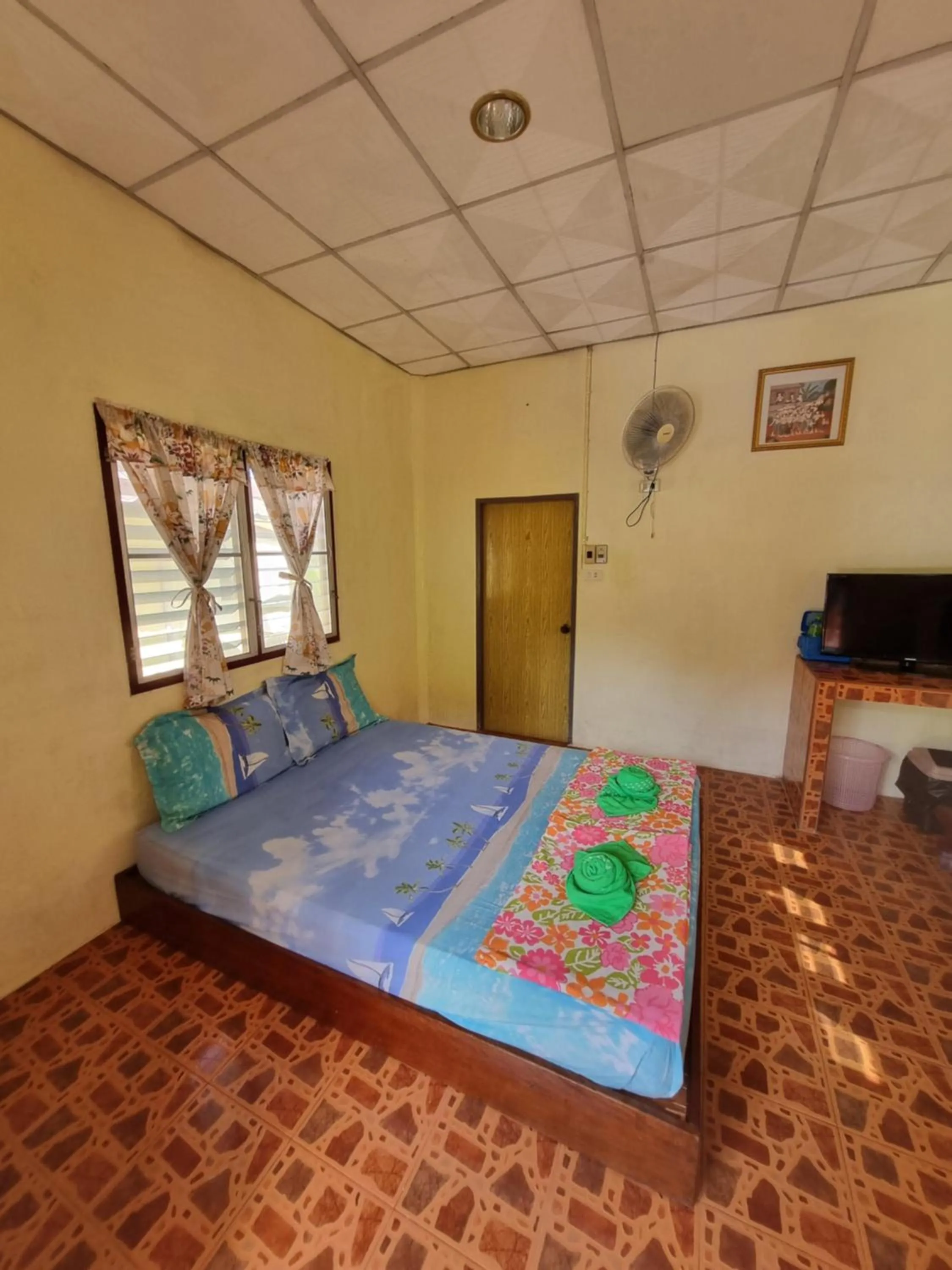 Bed in Day Night Bangalows