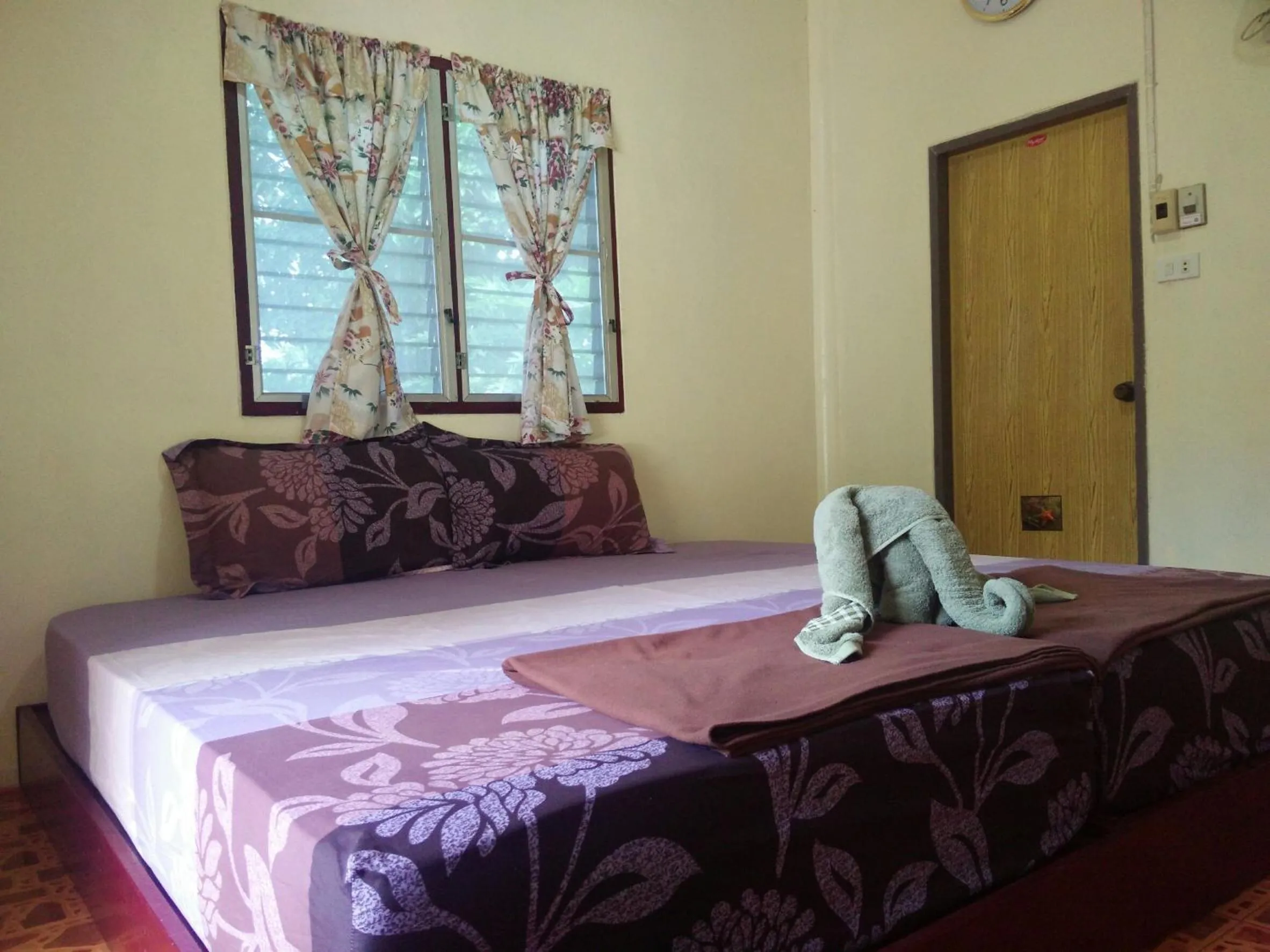 Bed in Day Night Bangalows