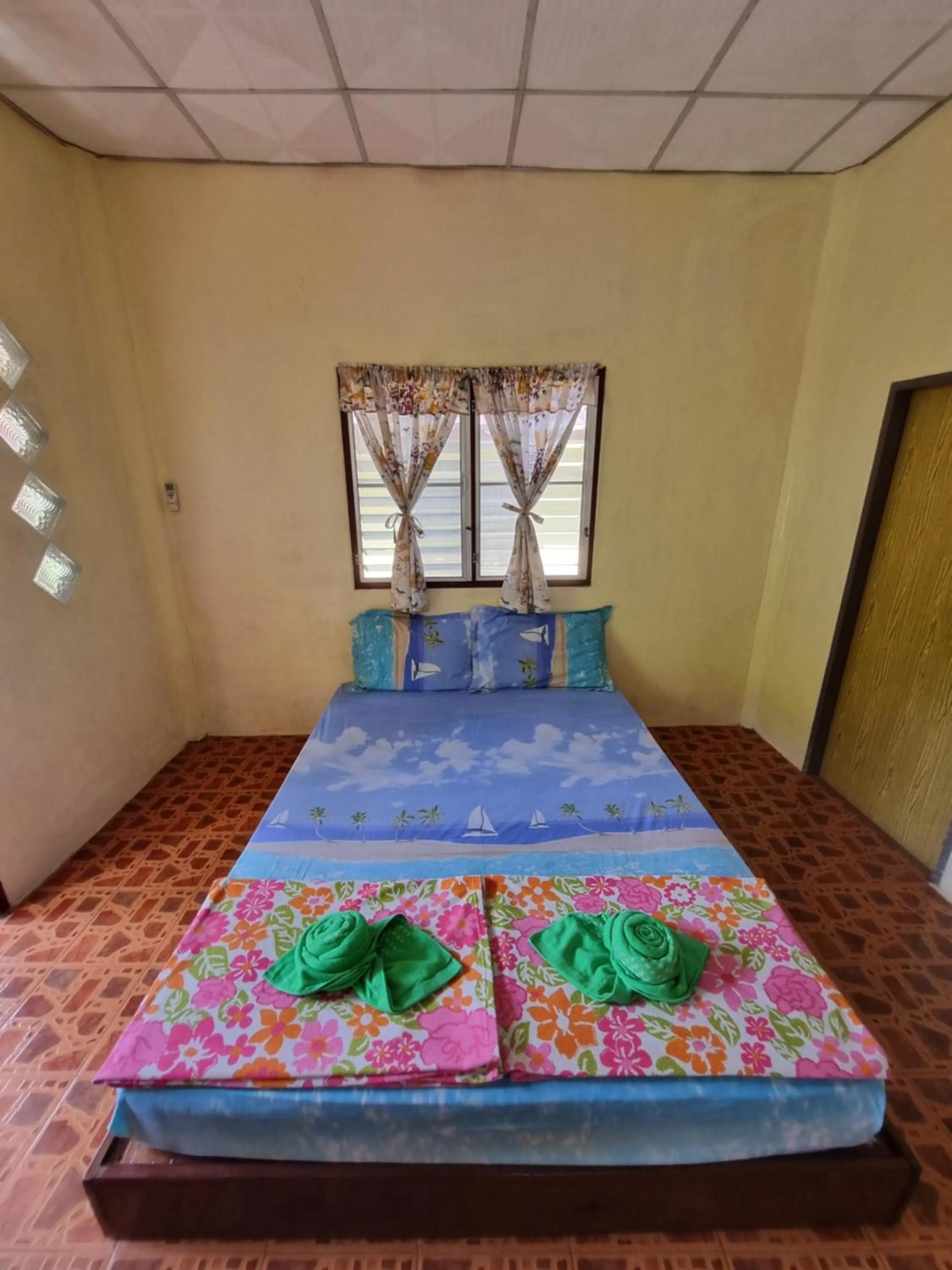 Bed in Day Night Bangalows