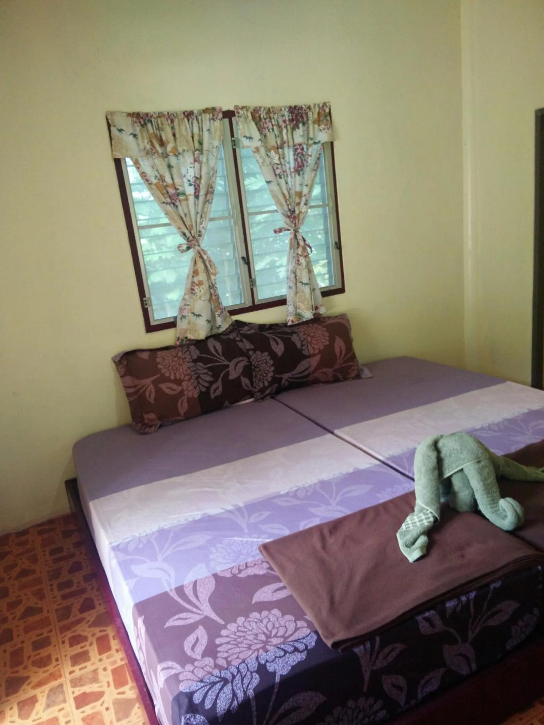 Bed in Day Night Bangalows