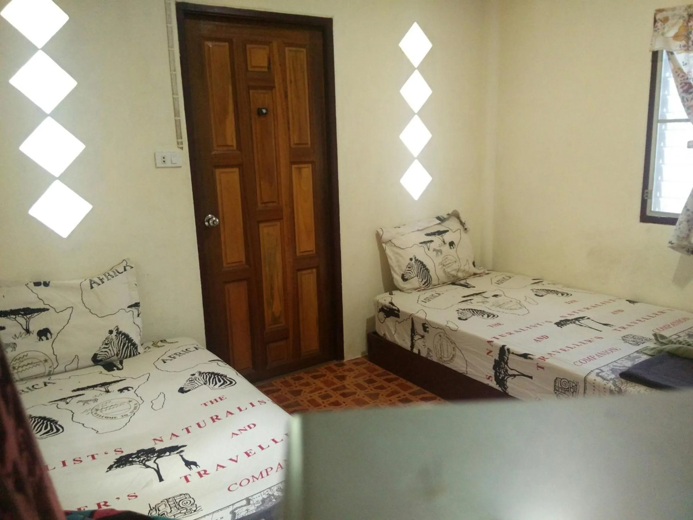 Bed in Day Night Bangalows