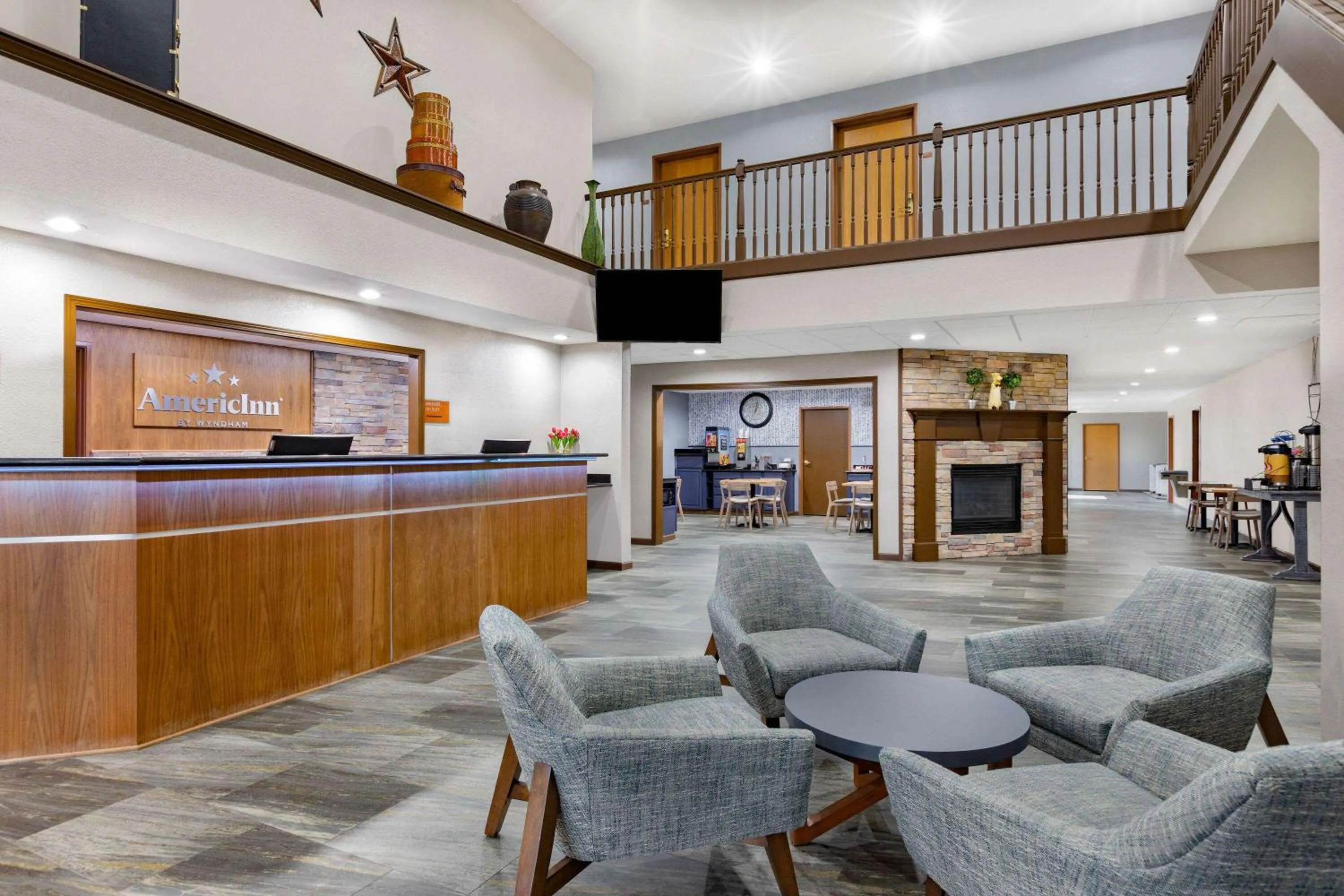 Lobby or reception in AmericInn by Wyndham Pella