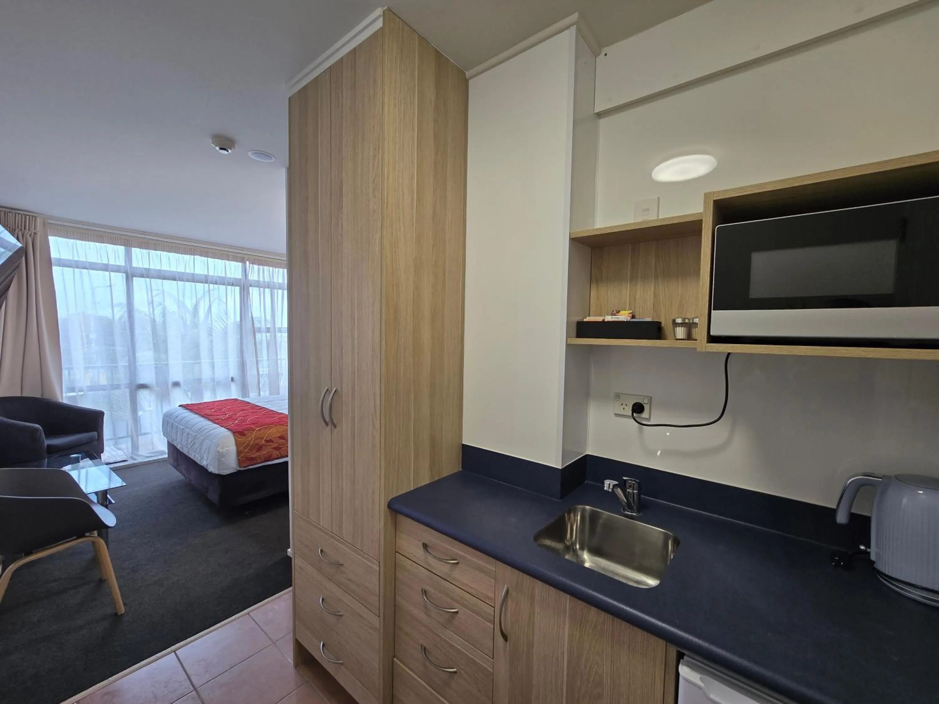 Bed in Bluewater Hotel