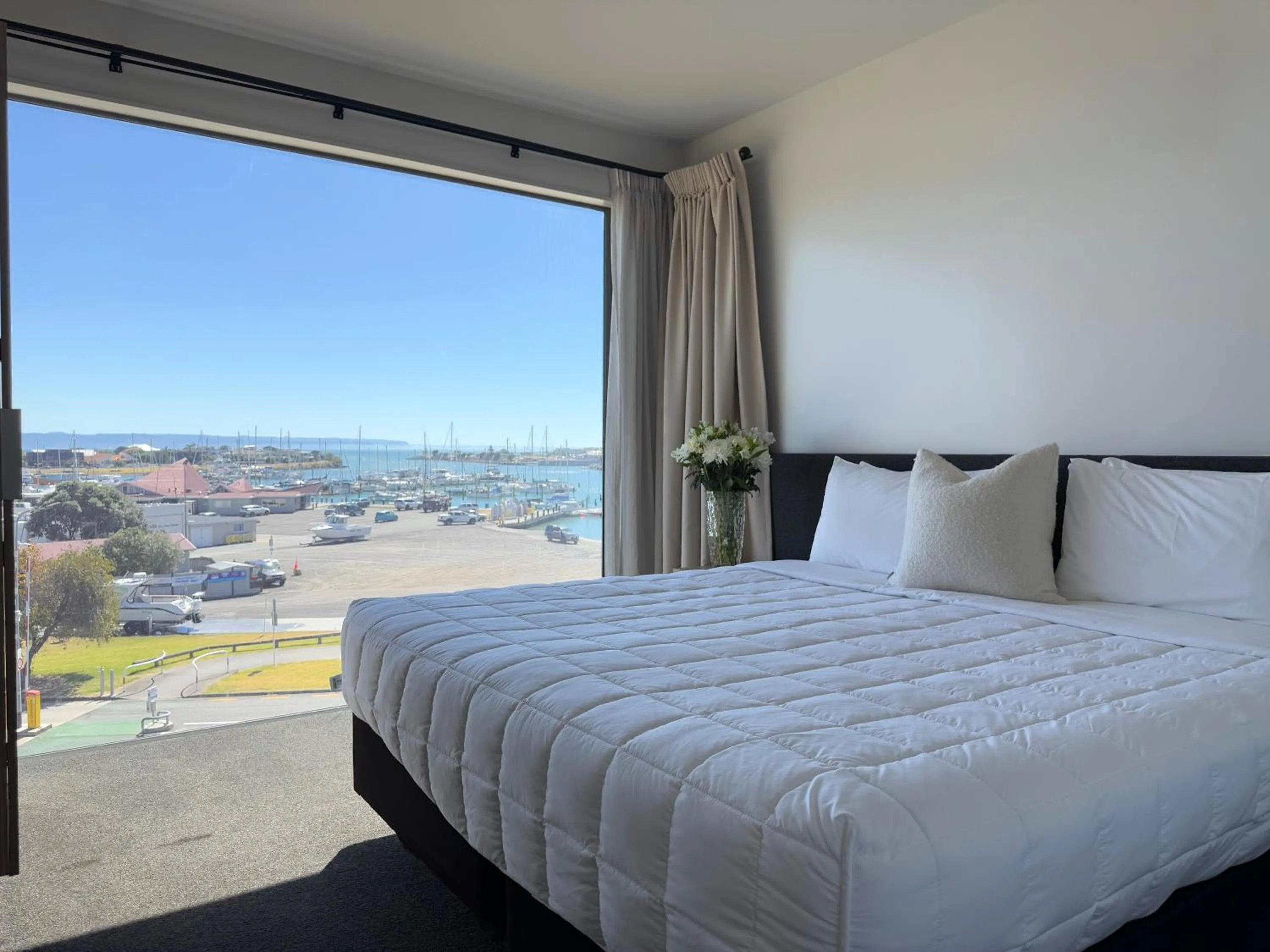 Bed in Bluewater Hotel