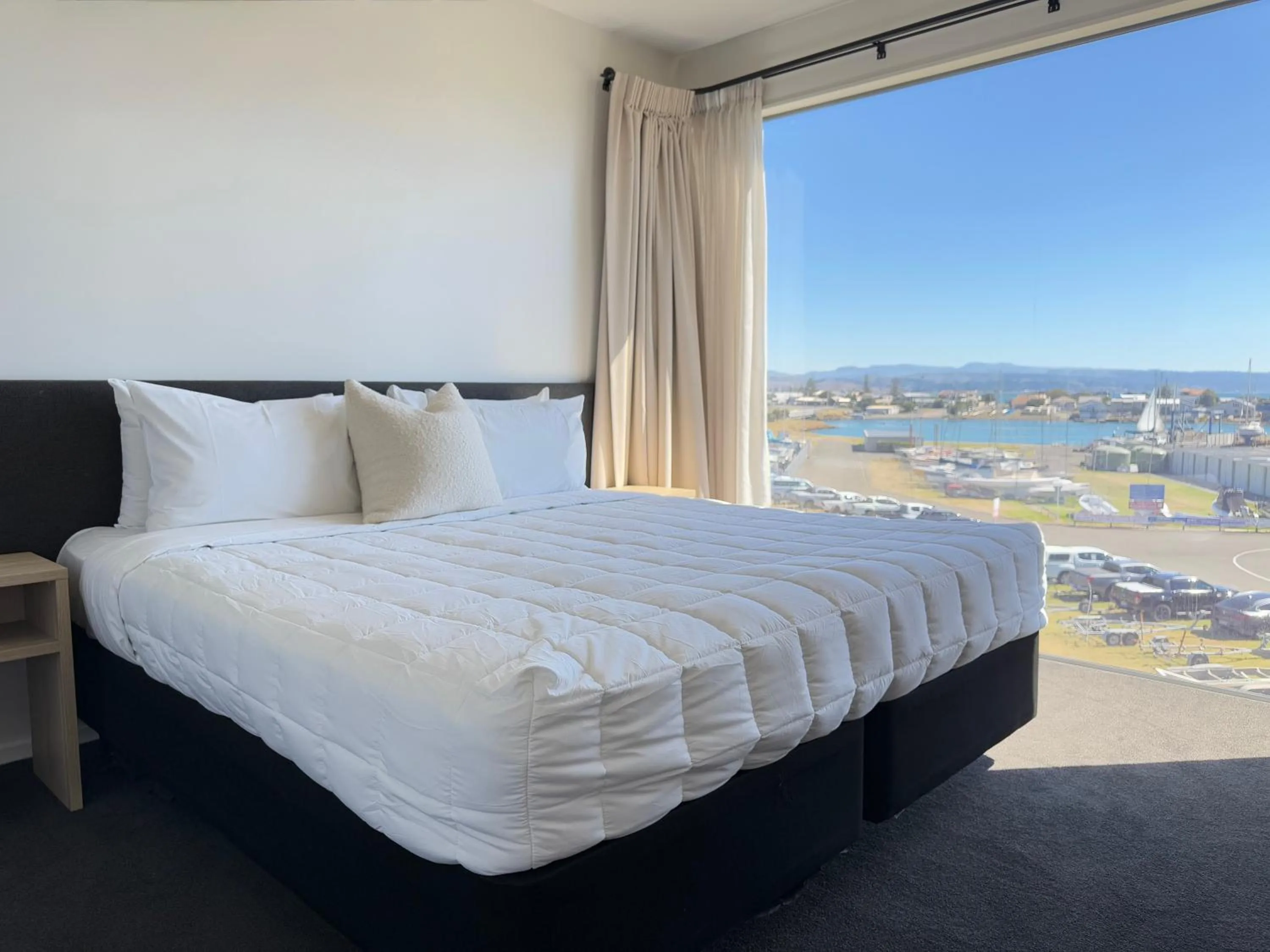 Bed in Bluewater Hotel