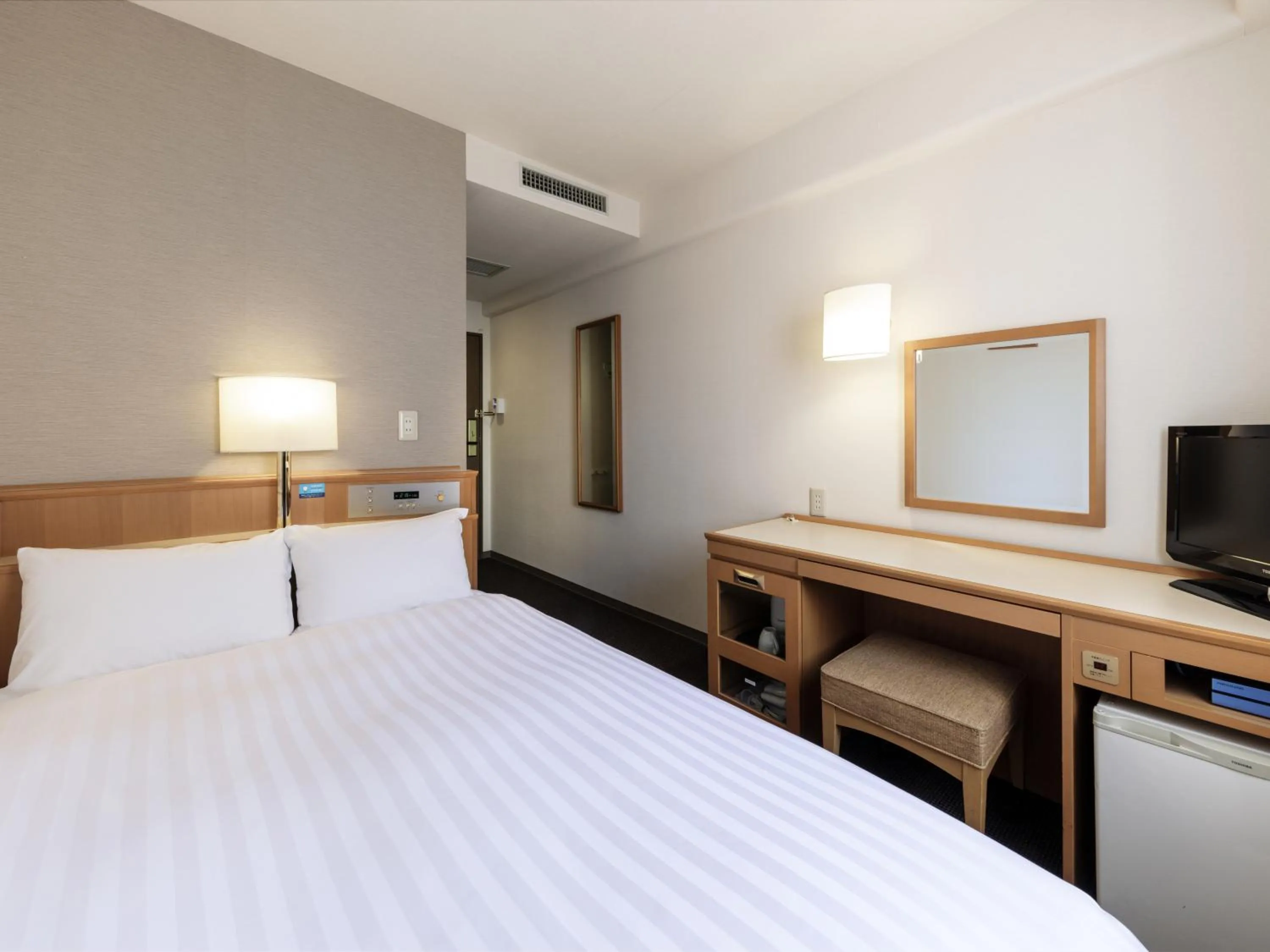 Photo of the whole room, Bed in Nishitetsu Inn Tenjin