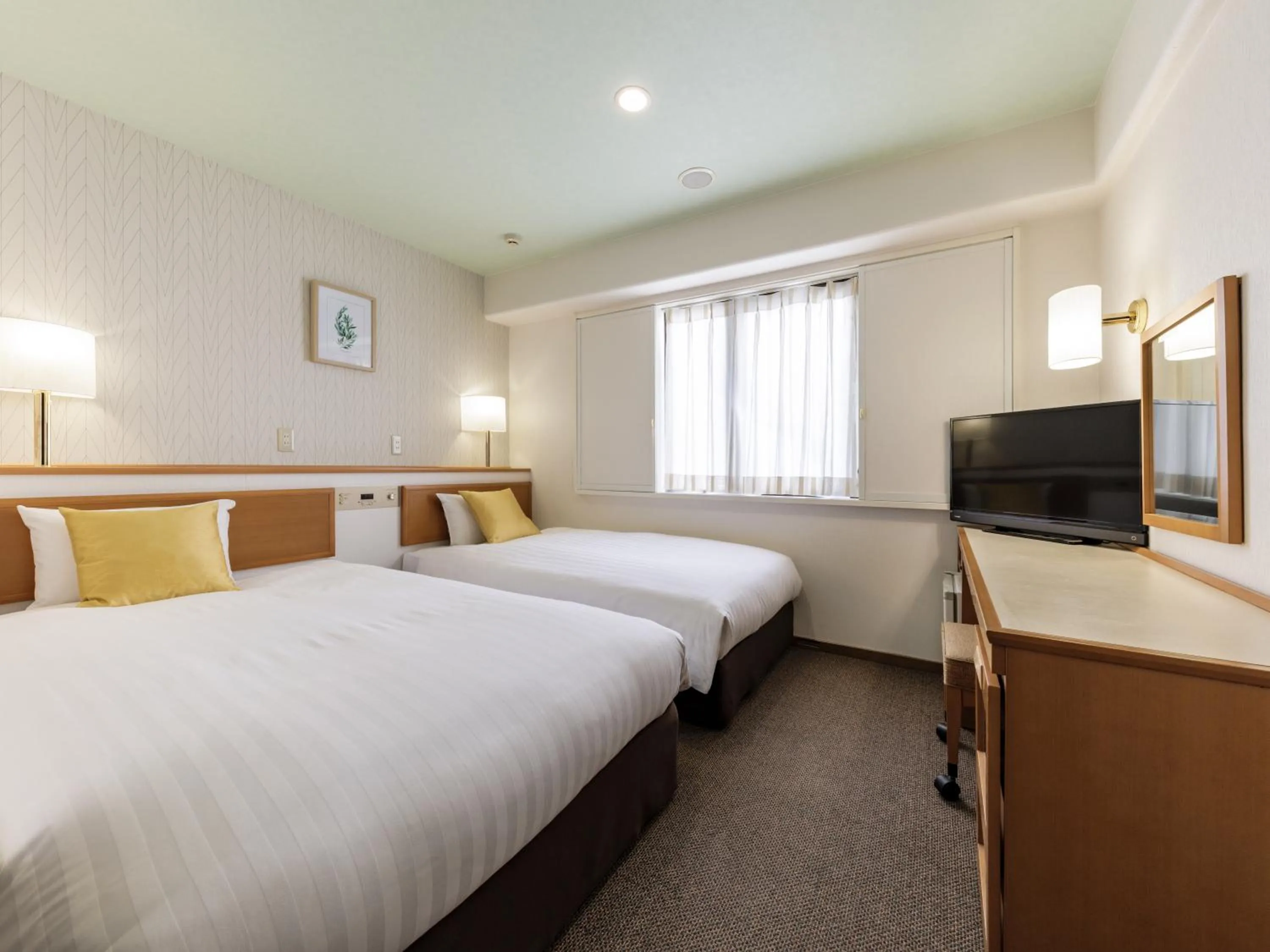 Photo of the whole room, Bed in Nishitetsu Inn Tenjin