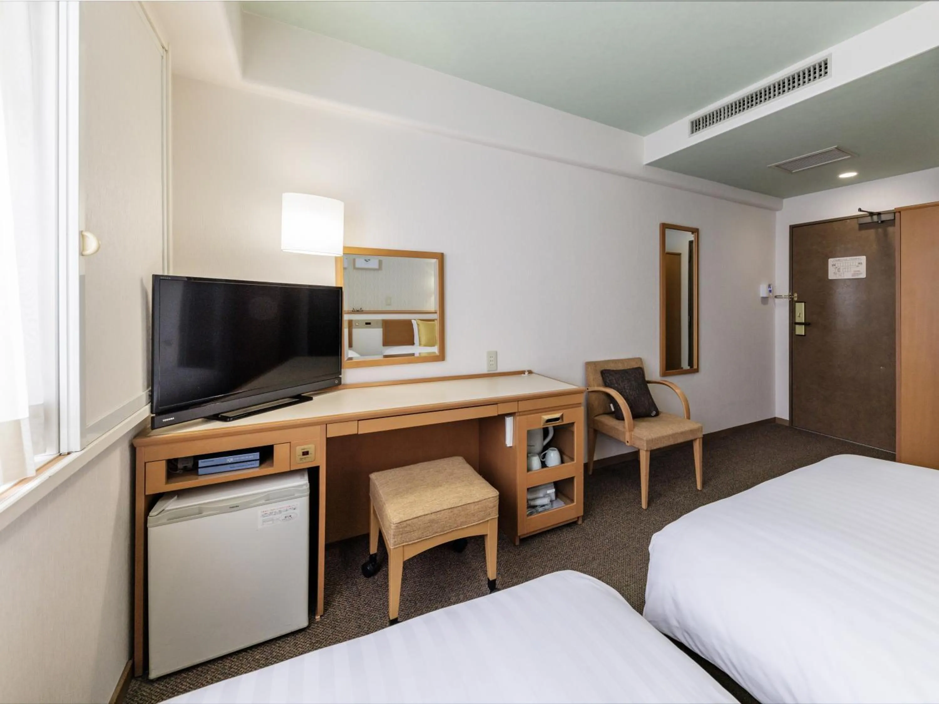 Photo of the whole room, Bed in Nishitetsu Inn Tenjin