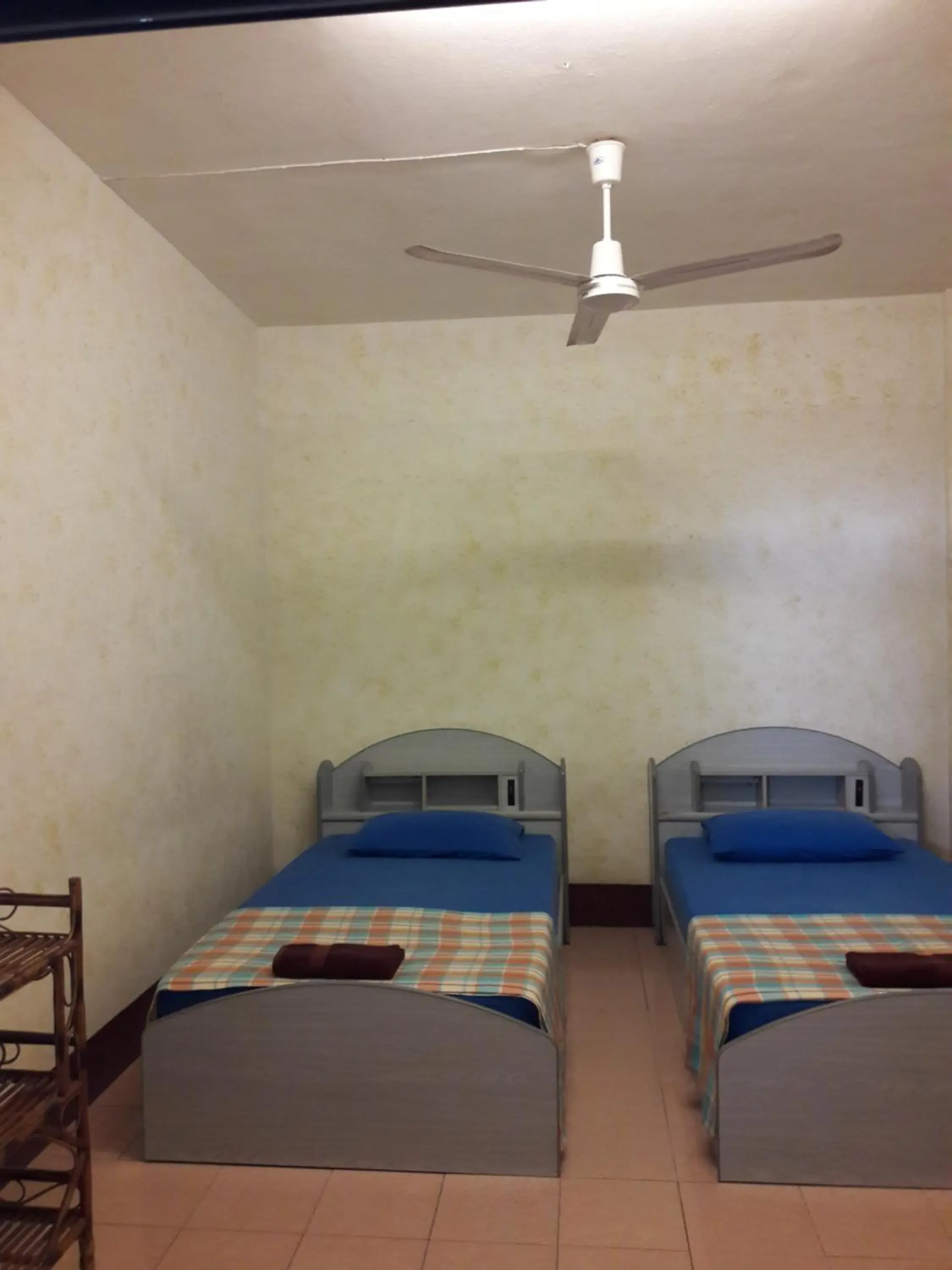 Twin Room with Fan and Shared Bathroom in JP hometel Twin Room with Fan and Shared Bathroom in JP hometel