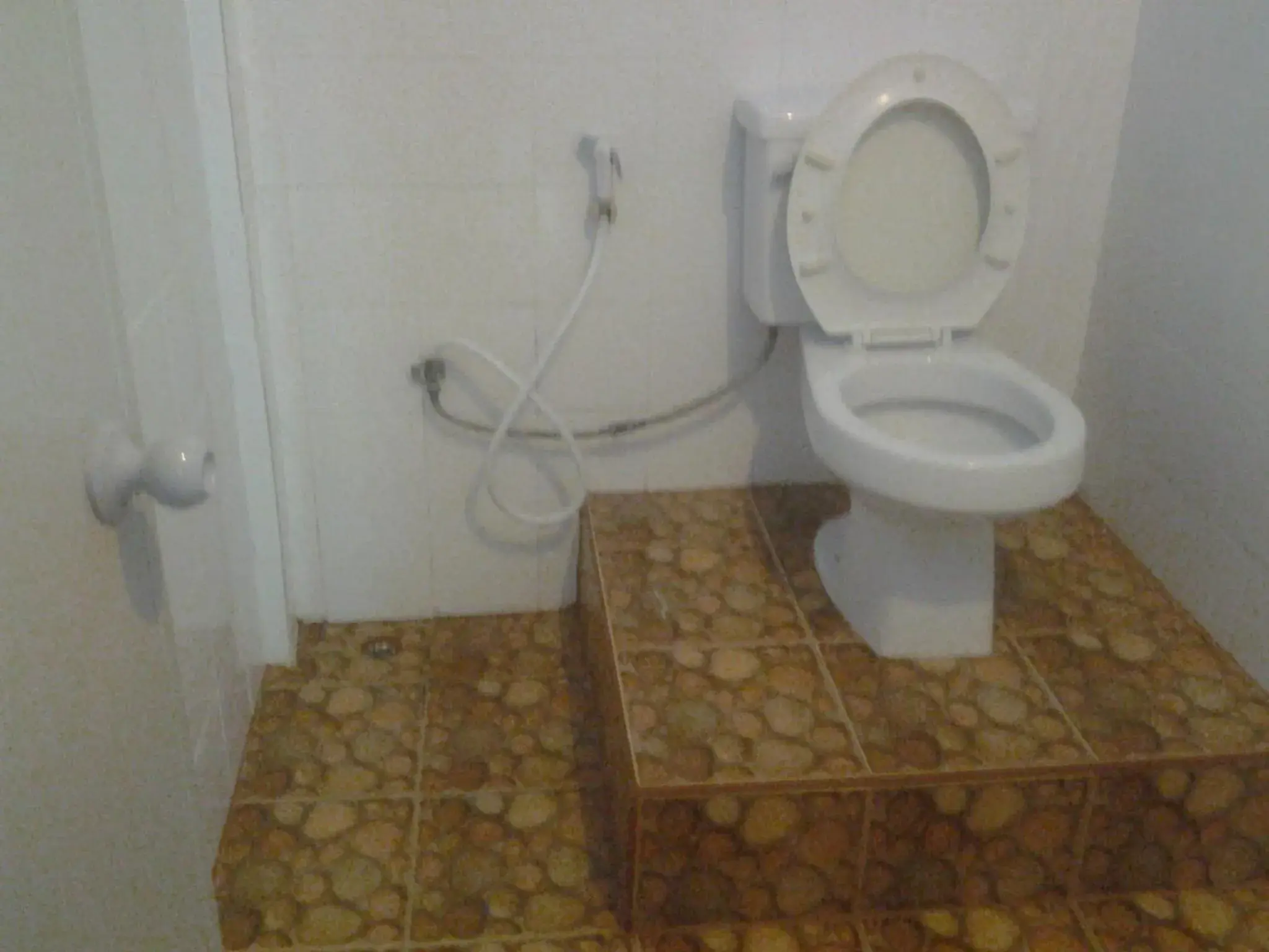 Twin Room with Fan and Shared Bathroom in JP hometel Twin Room with Fan and Shared Bathroom in JP hometel