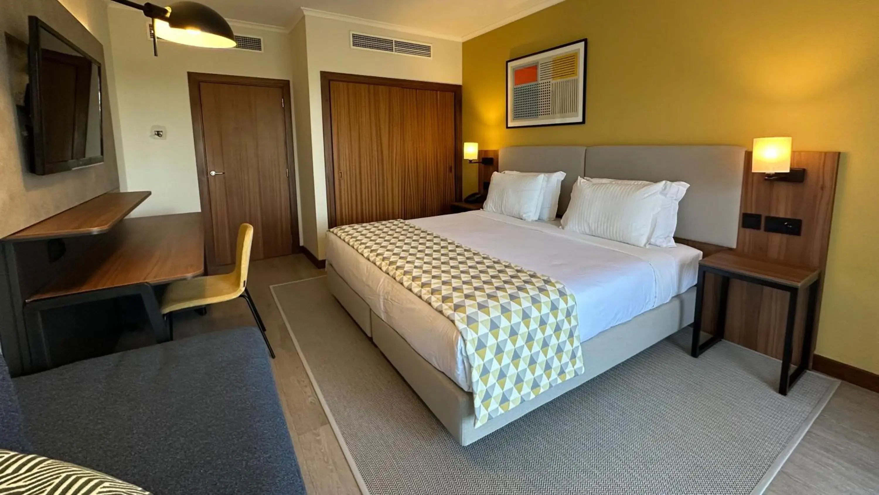 Bedroom, Bed in Holiday Inn Algarve Albufeira by IHG Bedroom, Bed in Holiday Inn Algarve Albufeira by IHG