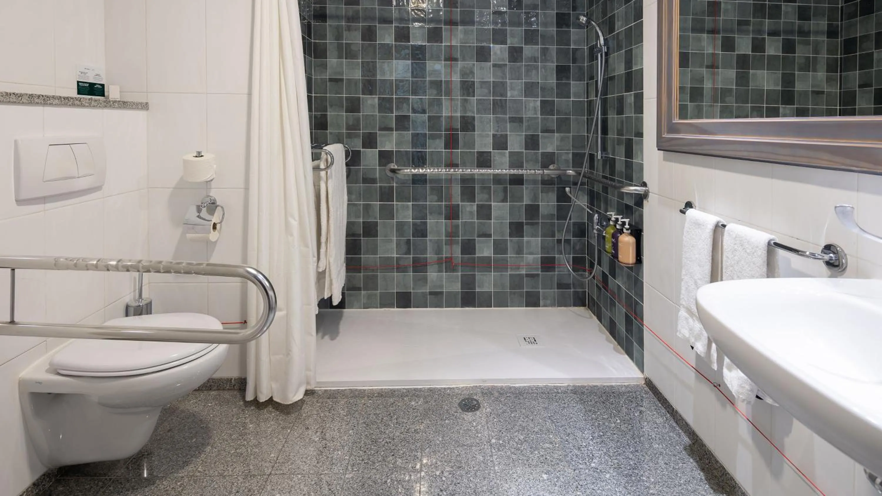 Shower in Holiday Inn Algarve Albufeira by IHG