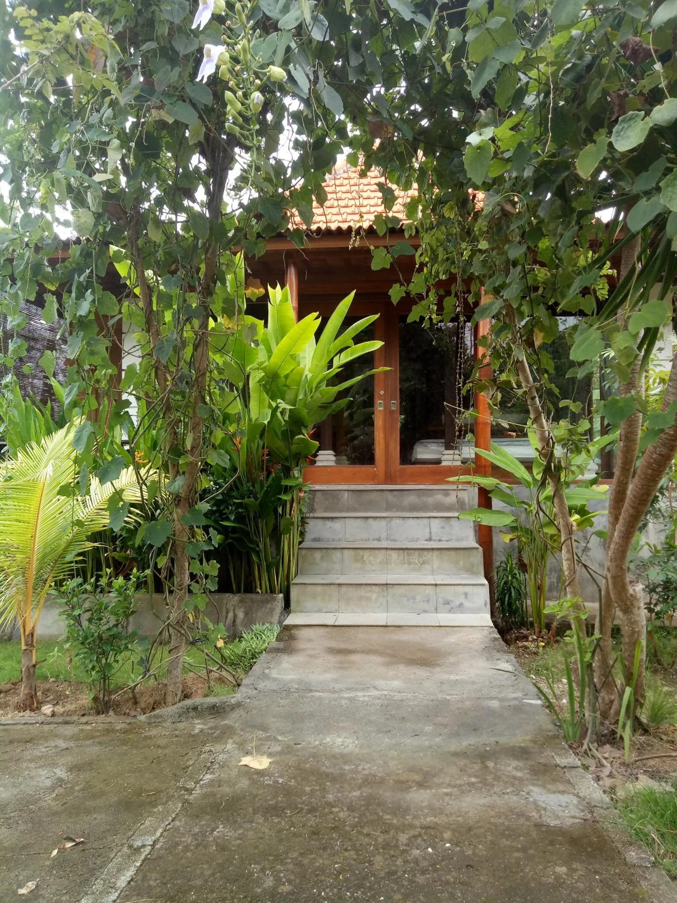 Deluxe Bungalow with Garden View in Pier26 Bali Homestay