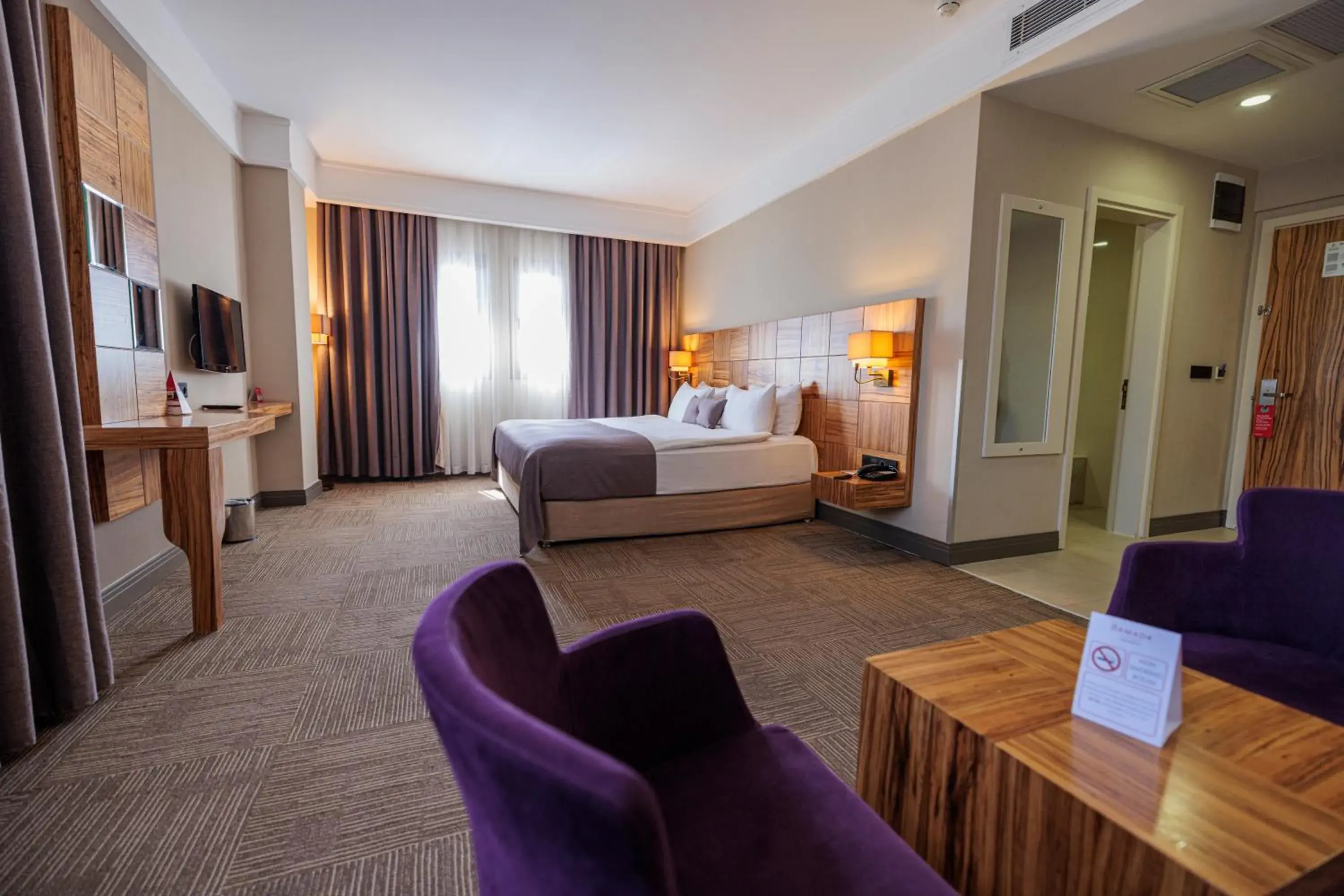 Bedroom, Bed in Ramada By Wyndham Cappadocia Bedroom, Bed in Ramada By Wyndham Cappadocia