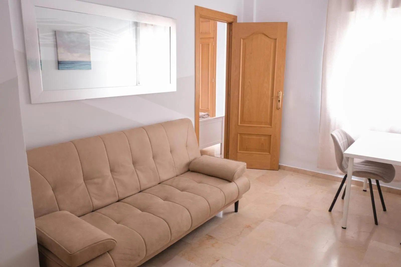 Seating area in ELENA Flat Malaga Center