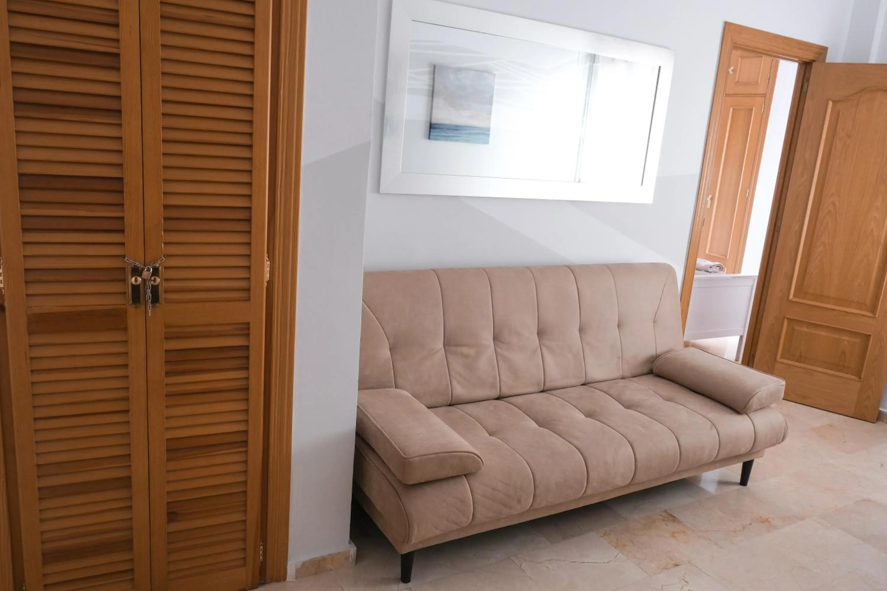 Seating area in ELENA Flat Malaga Center