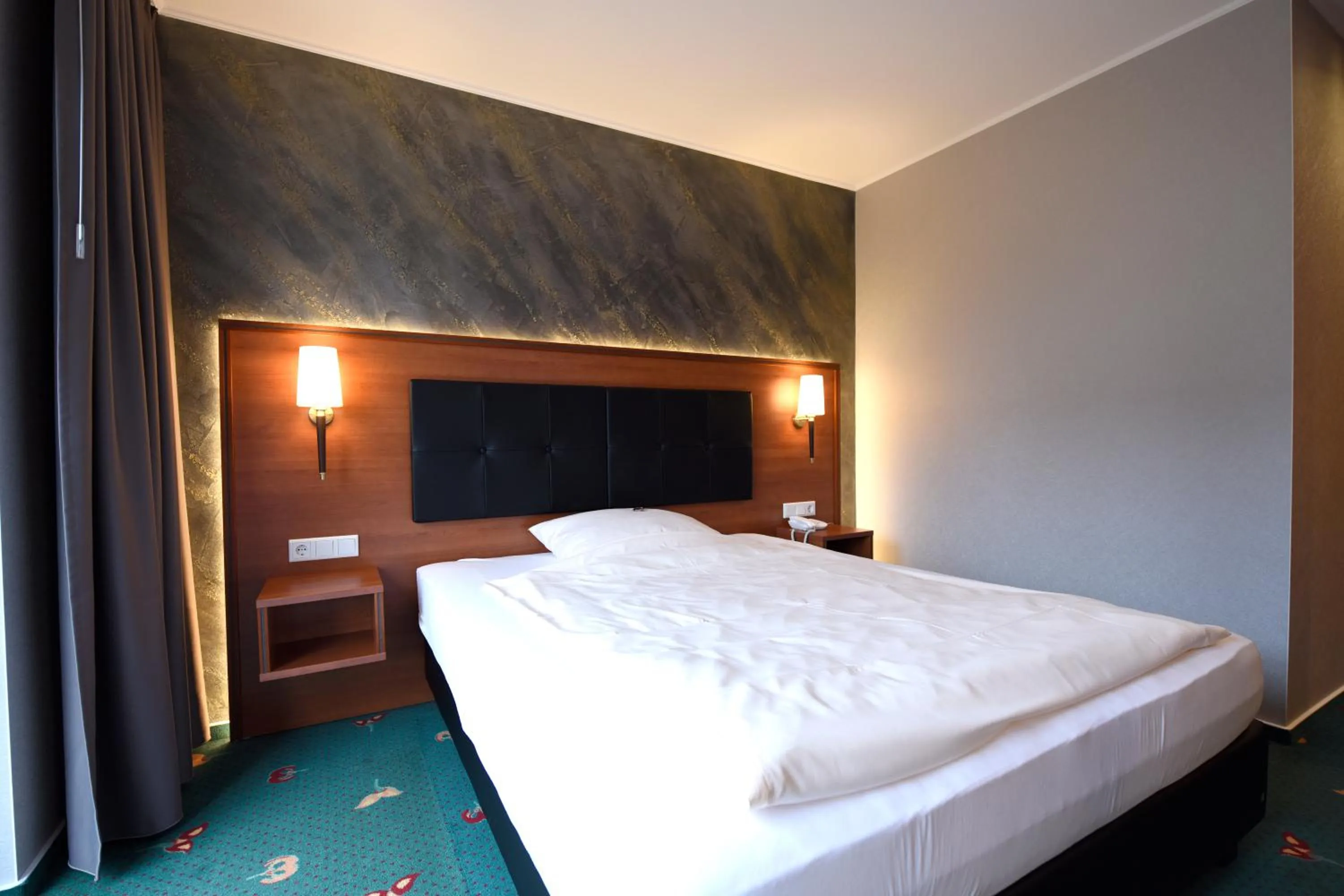 Bed in Hotel Freihof