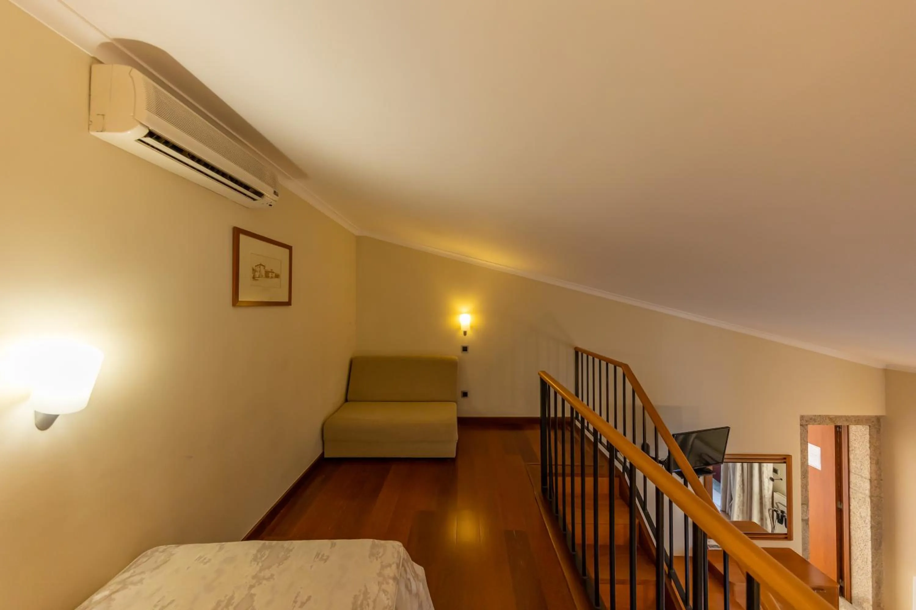 Seating area, Bed in Hotel Rural Quinta de Sao Sebastiao