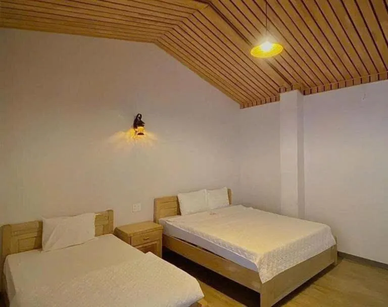 Bed in Catba Oasis Bungalows