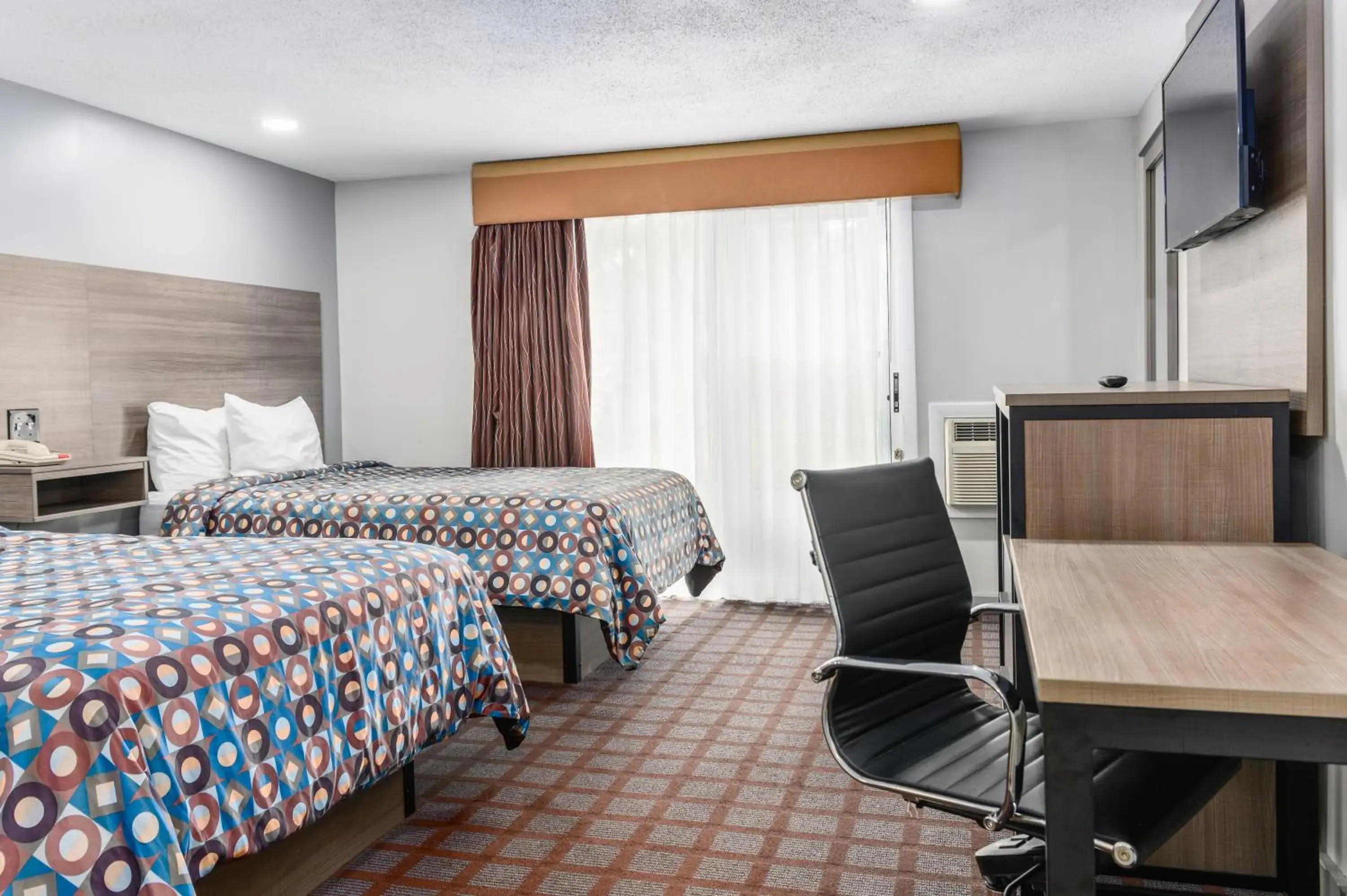 Bed in Blue Dolphin Inn Bed in Blue Dolphin Inn