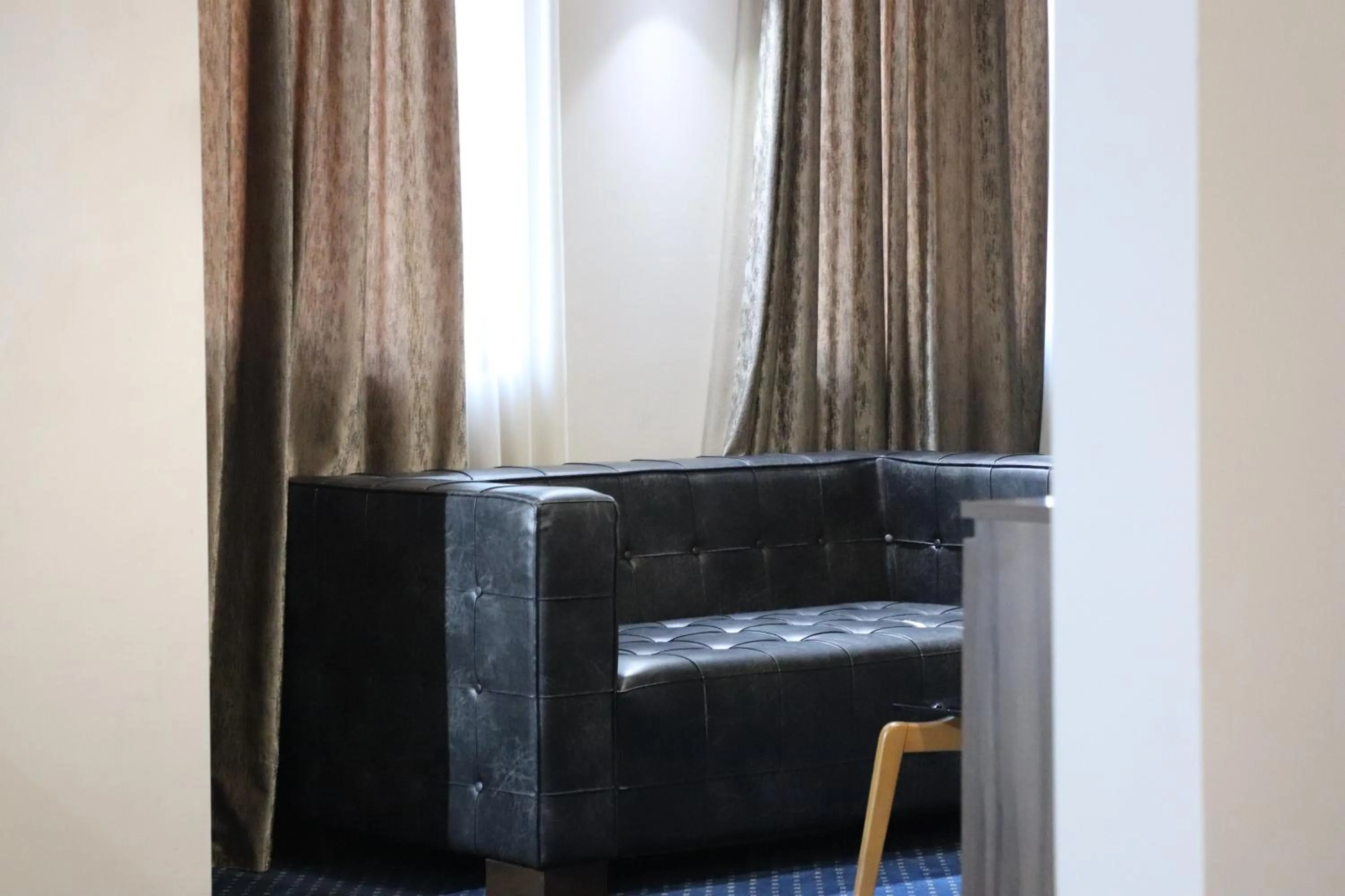 Communal lounge/ TV room in Garden Palace