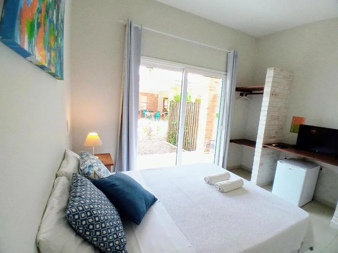 Bed in Kauano Pousada Barequeçaba