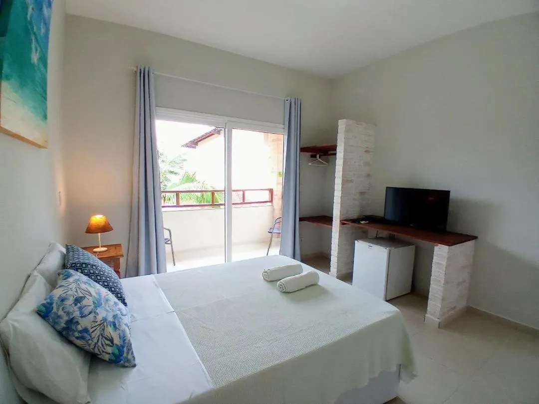 Bed in Kauano Pousada Barequeçaba