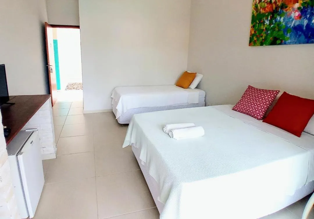 Bed in Kauano Pousada Barequeçaba