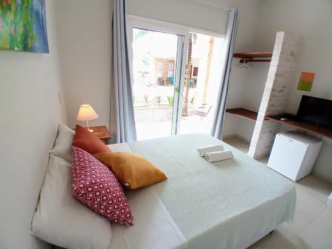 Bed in Kauano Pousada Barequeçaba