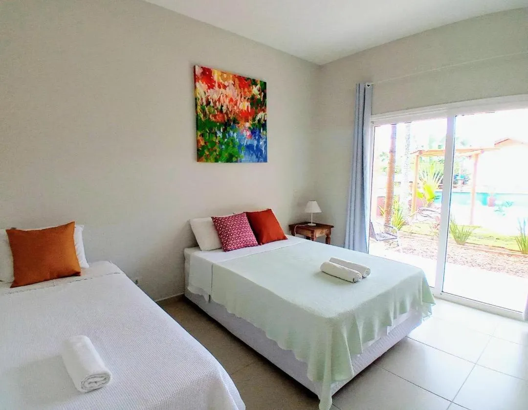Bed in Kauano Pousada Barequeçaba
