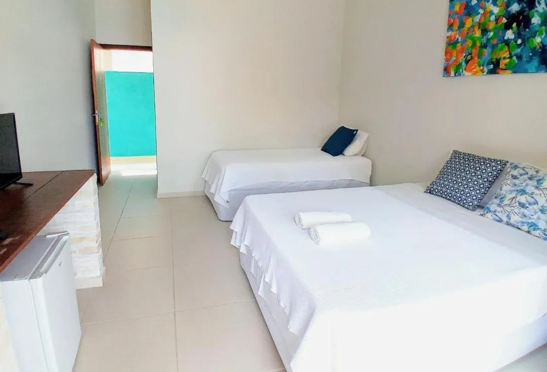 Bed in Kauano Pousada Barequeçaba
