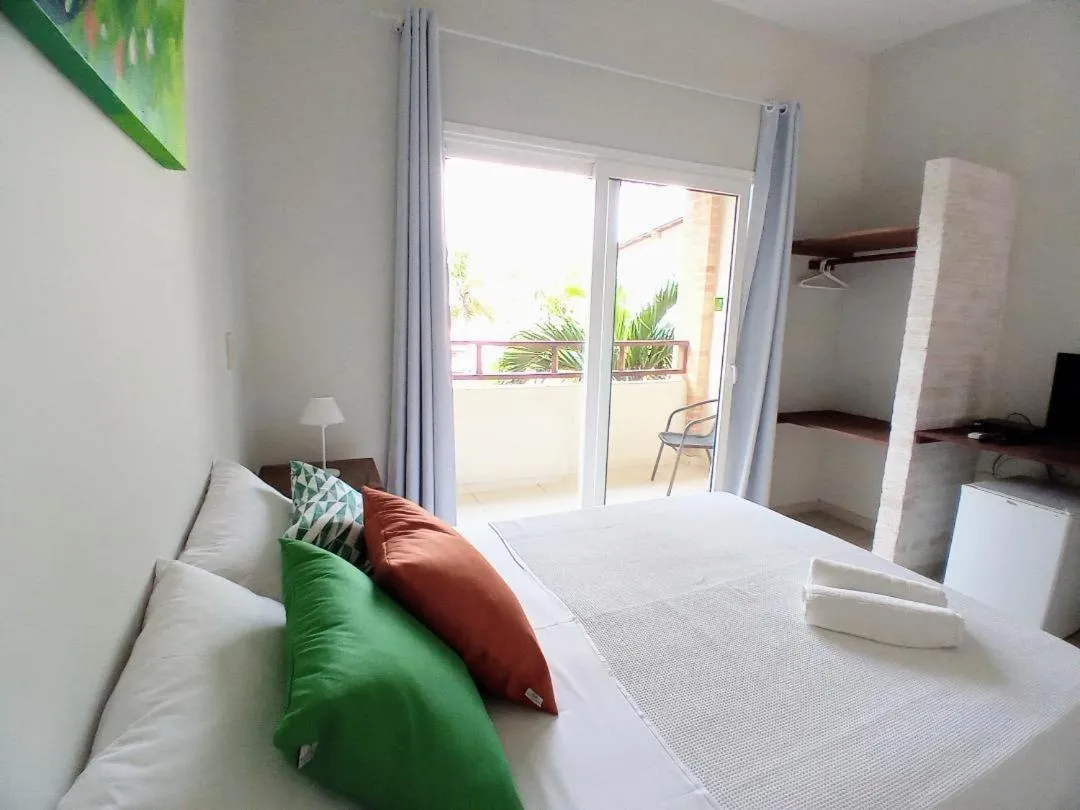 Bed in Kauano Pousada Barequeçaba