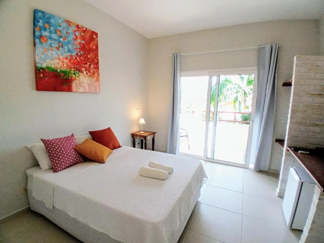 Bed in Kauano Pousada Barequeçaba