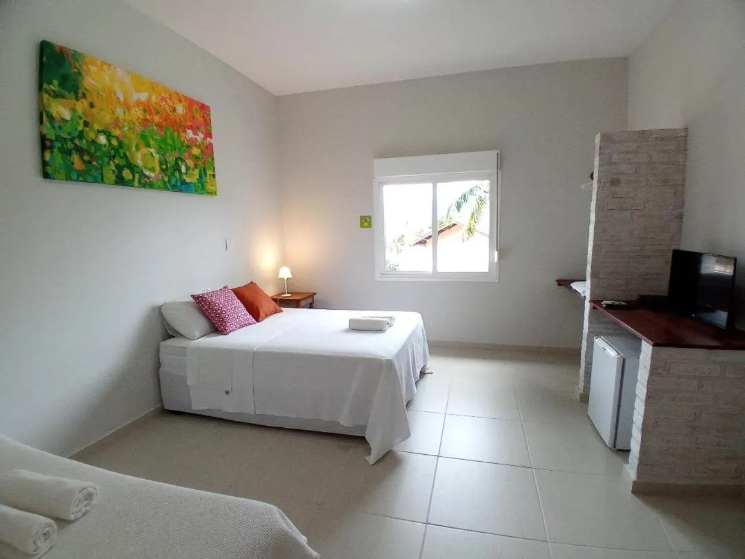 Bed in Kauano Pousada Barequeçaba