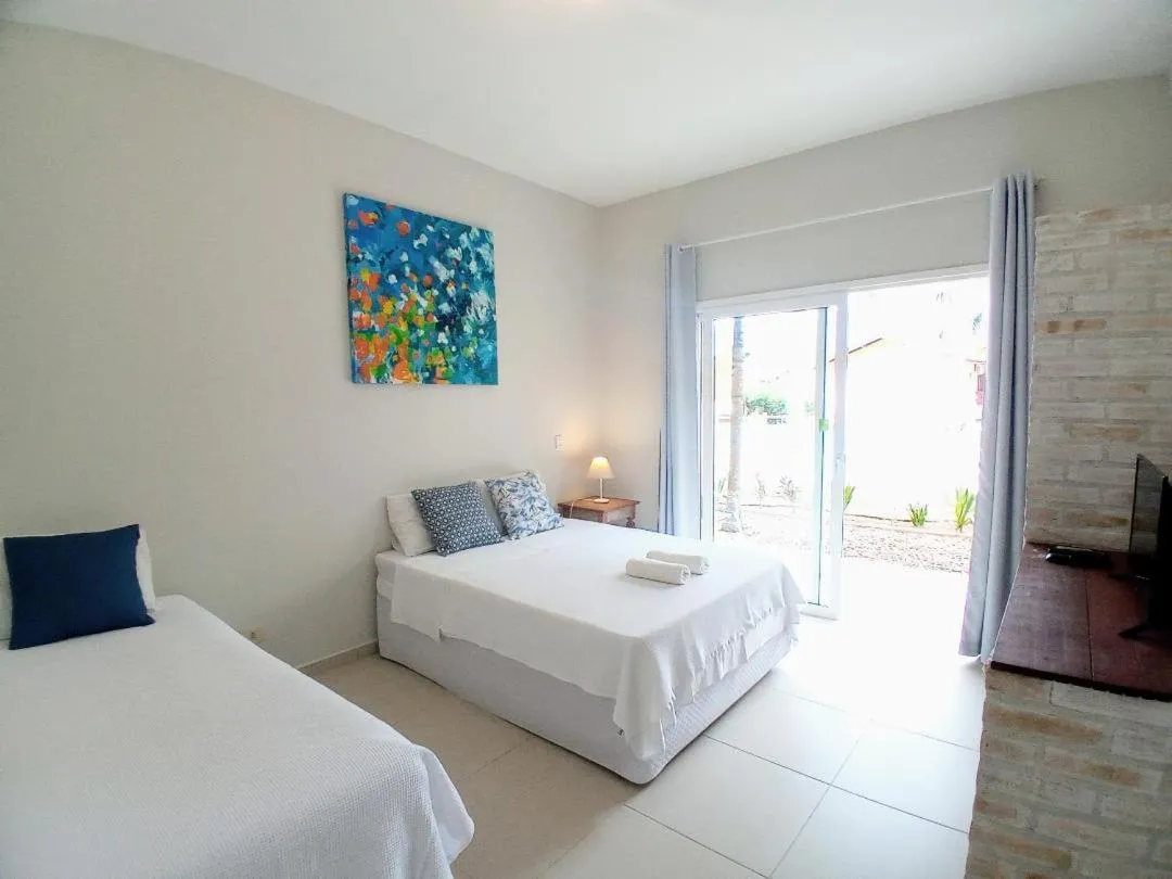 Bed in Kauano Pousada Barequeçaba