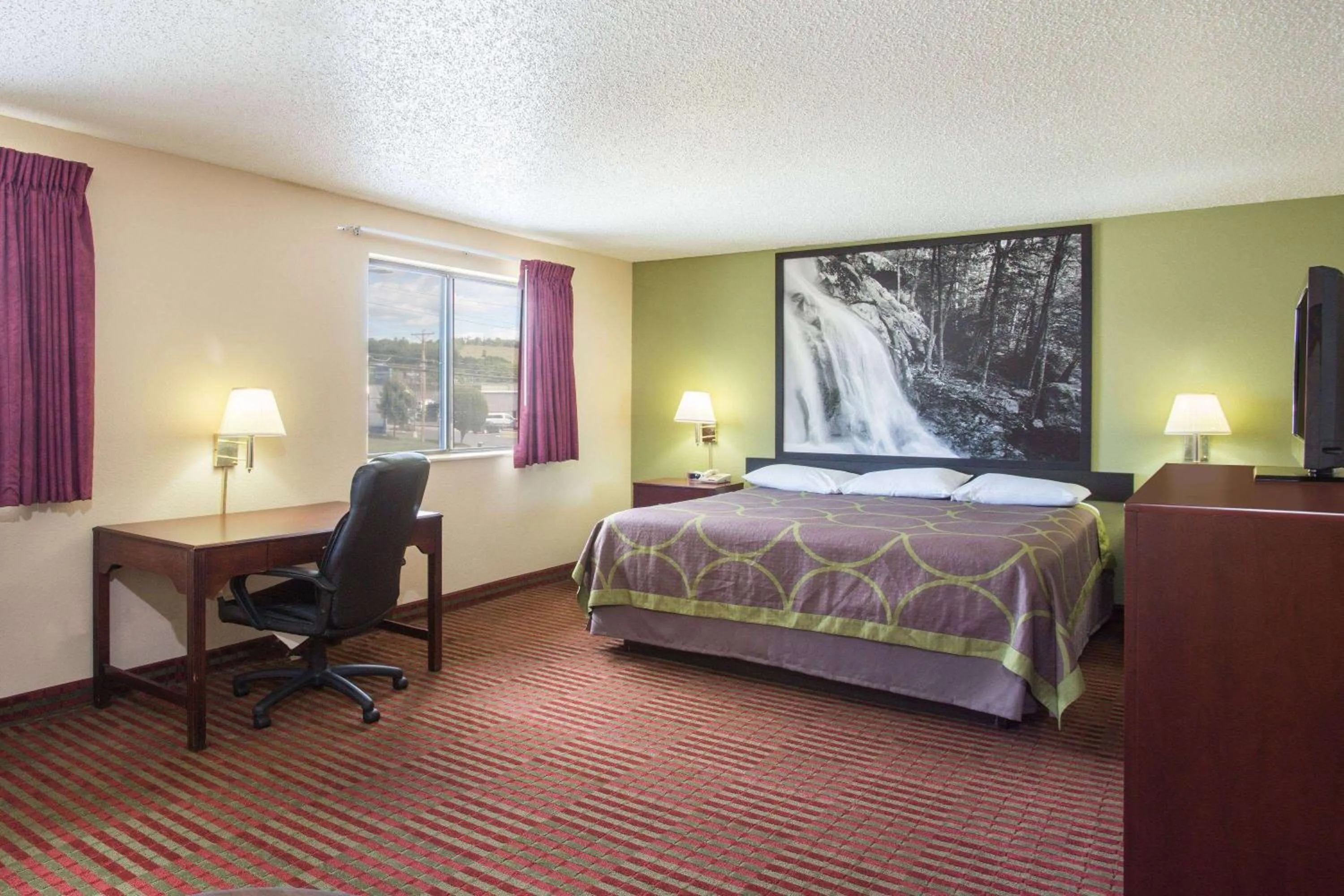 Bed in Super 8 by Wyndham Harrisonburg