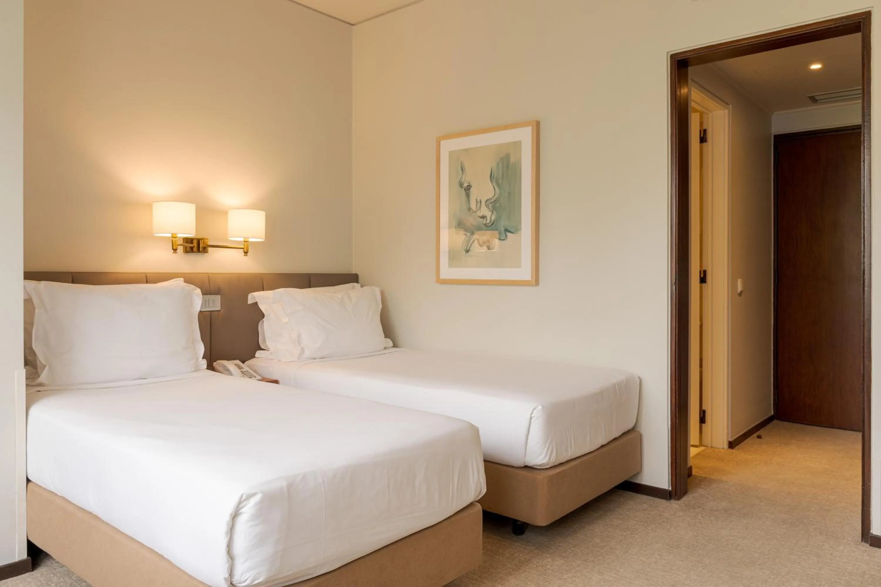 Bed in Hotel Dom Carlos Park