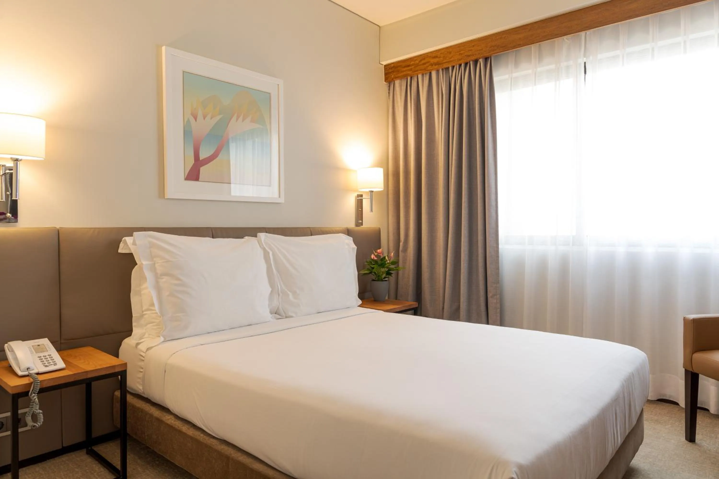 Bed in Hotel Dom Carlos Park