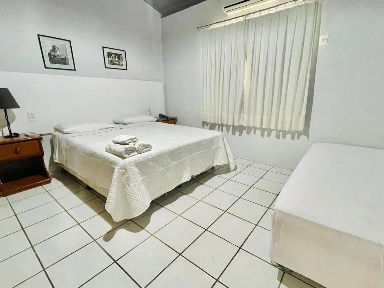 View (from property/room), Bed in Hotel - Apart-hotel Chalé Executivo