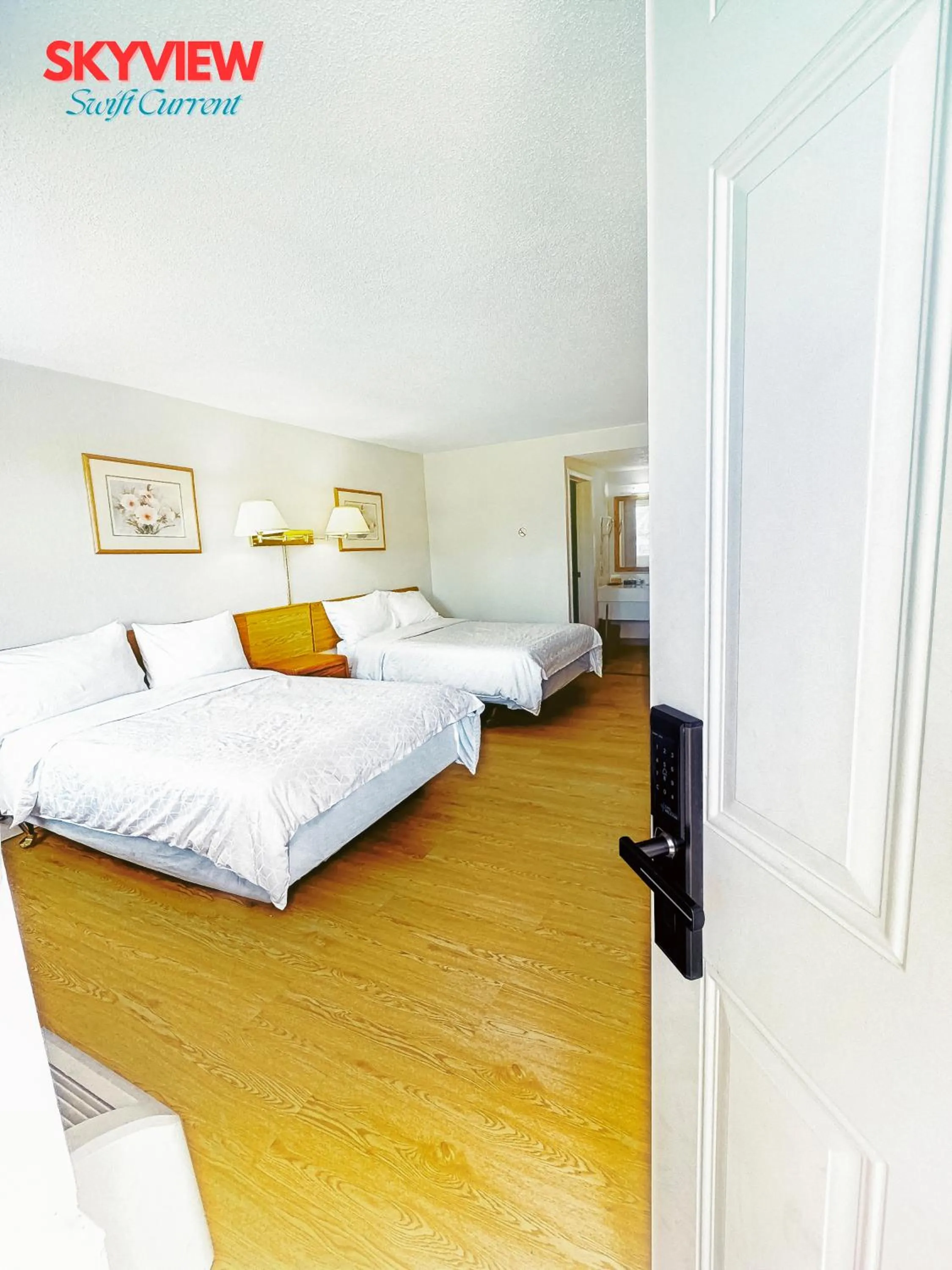 Photo of the whole room, Bed in SkyView Swift Current