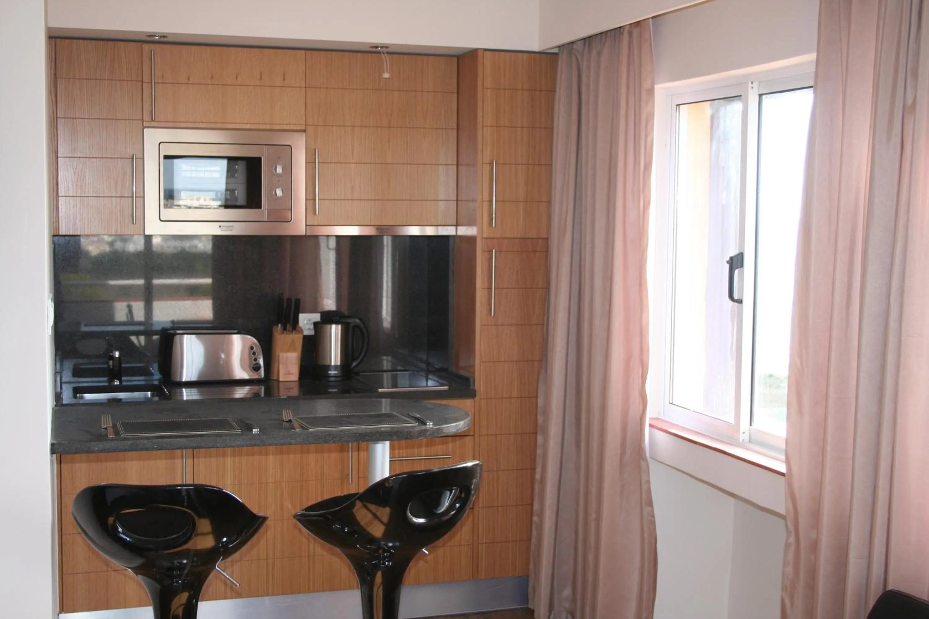 Kitchen or kitchenette in Pestana Alvor Atlantico Residences Beach Suites