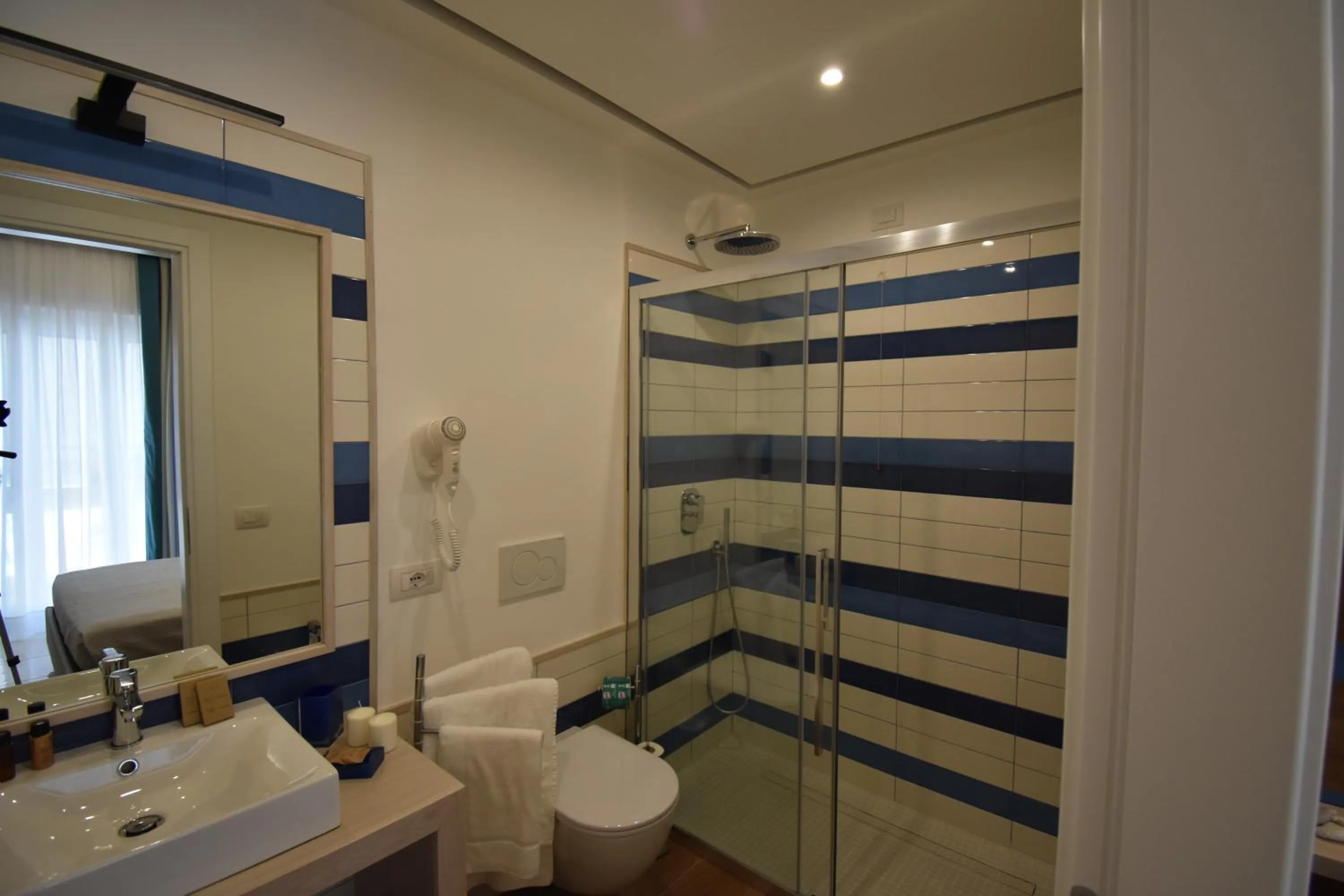 Bathroom in Melody Sorrento Suites