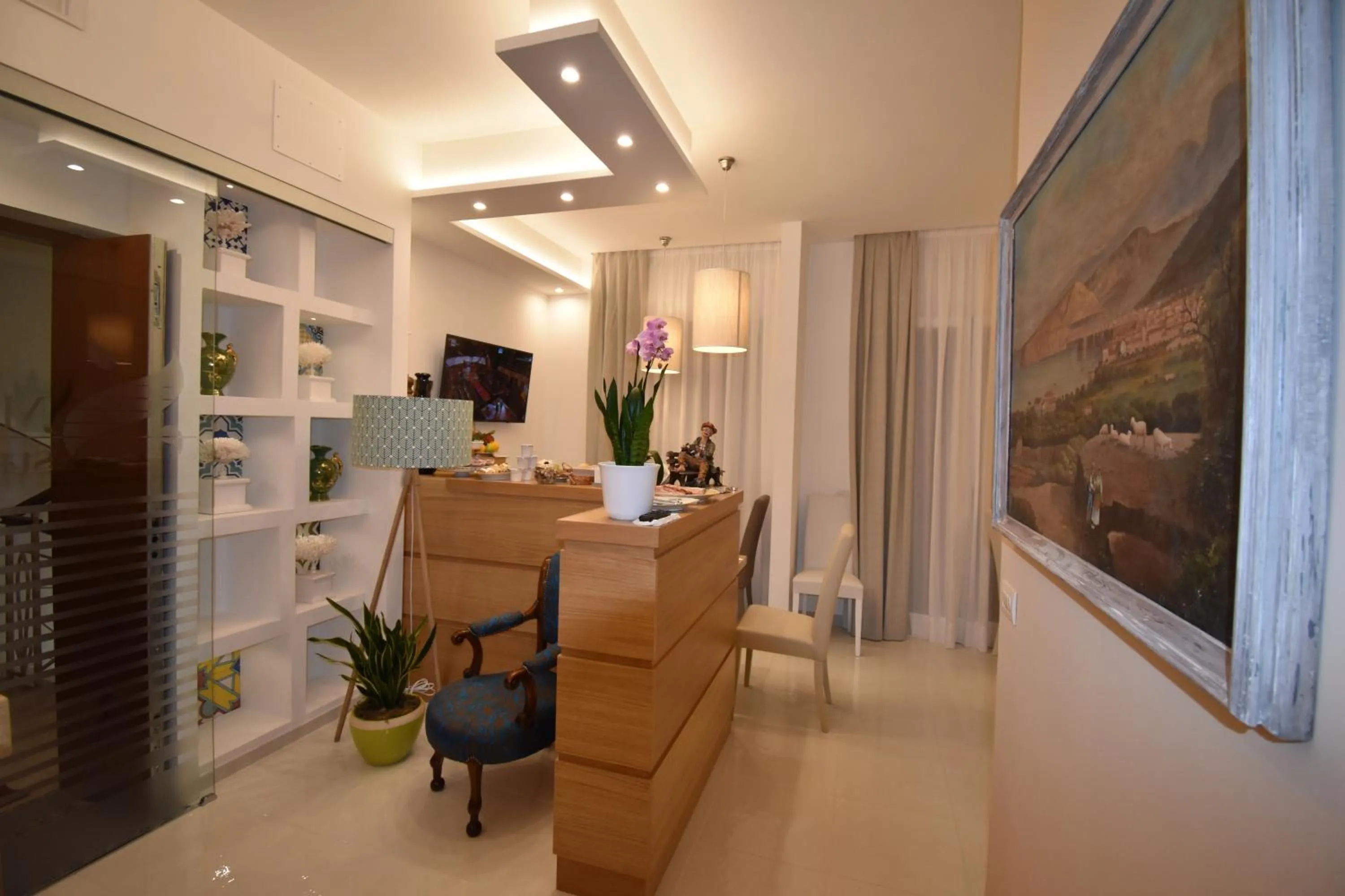 Communal lounge/ TV room in Melody Sorrento Suites