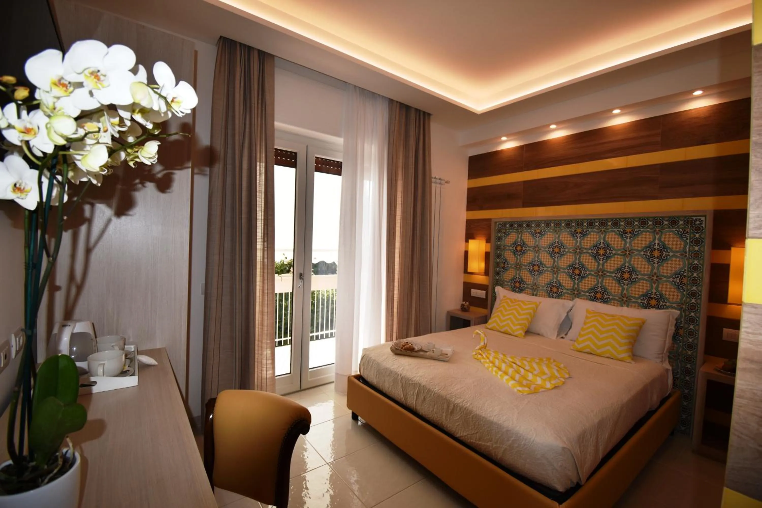 Photo of the whole room, Bed in Melody Sorrento Suites