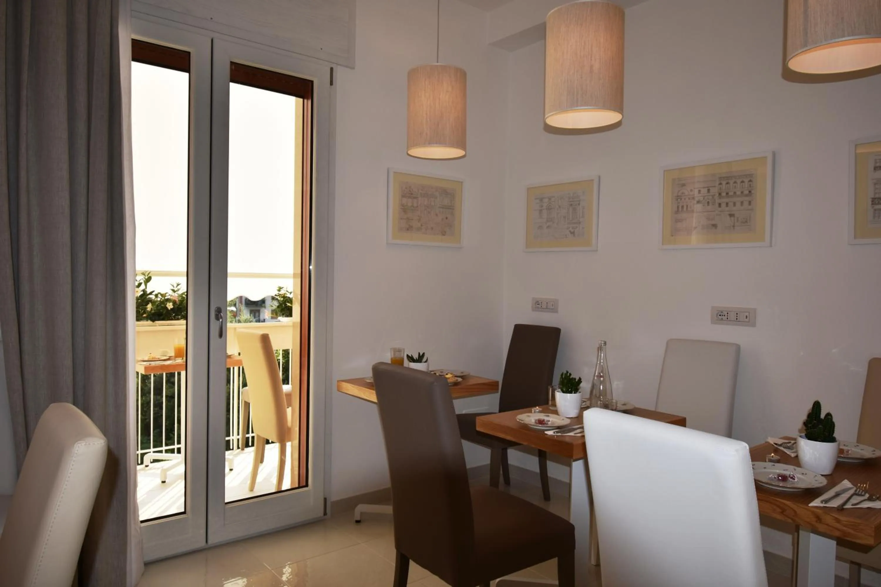 Communal lounge/ TV room in Melody Sorrento Suites