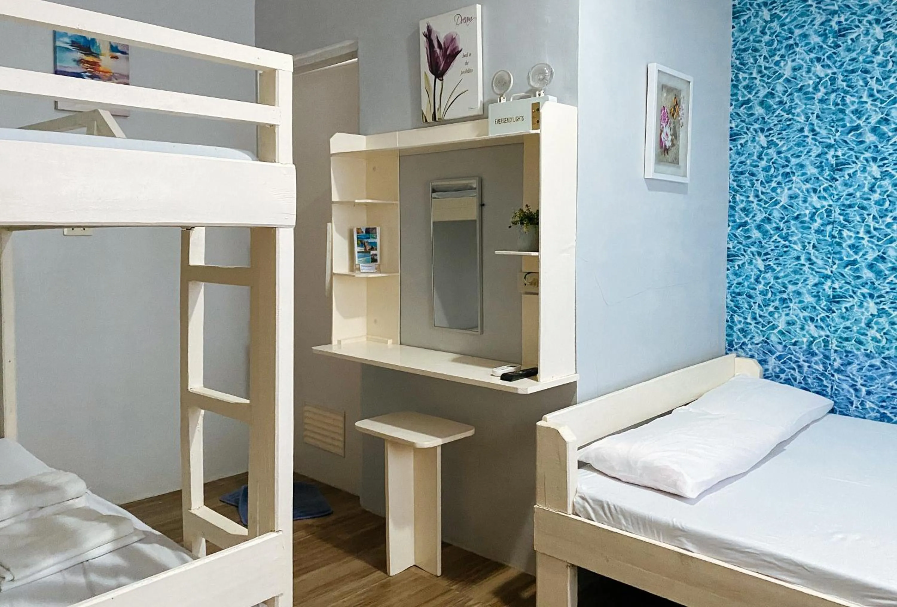 Photo of the whole room in UrbanView BNKY Bed and Breakfast Palawan by RedDoorz