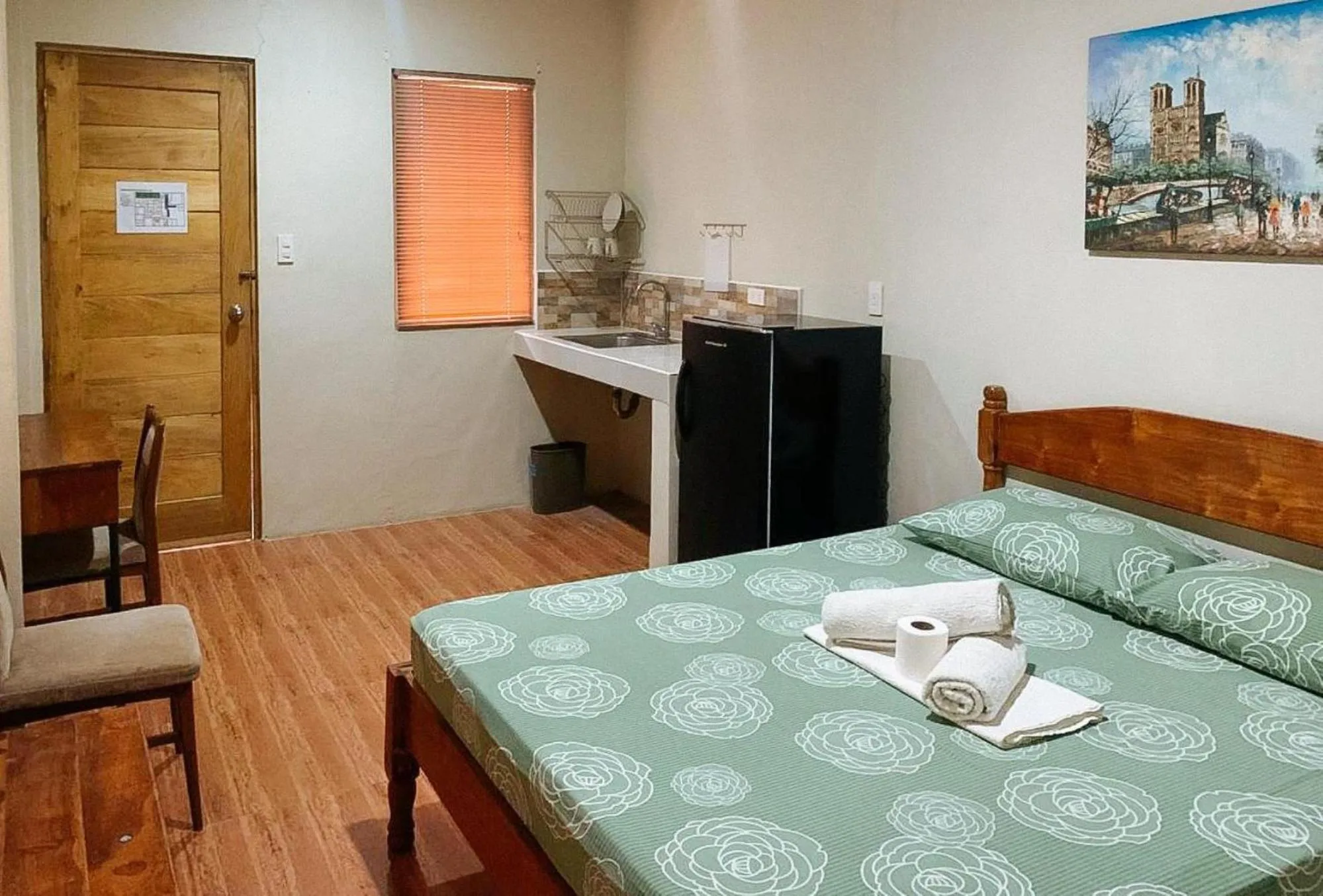 Kitchen or kitchenette in UrbanView BNKY Bed and Breakfast Palawan by RedDoorz