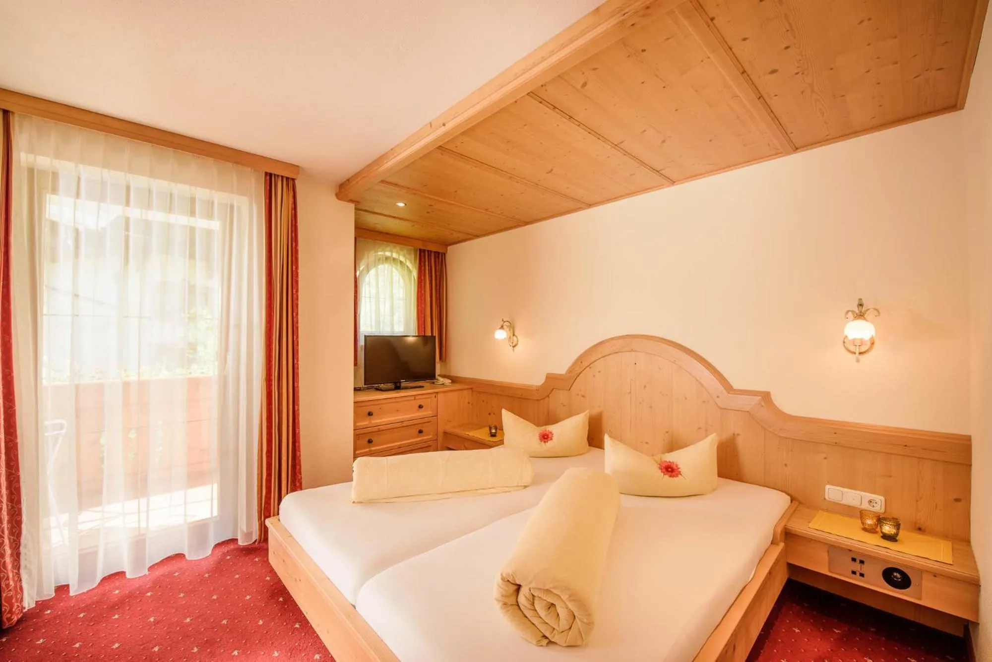 Bed in Alpenpension Pfurtscheller