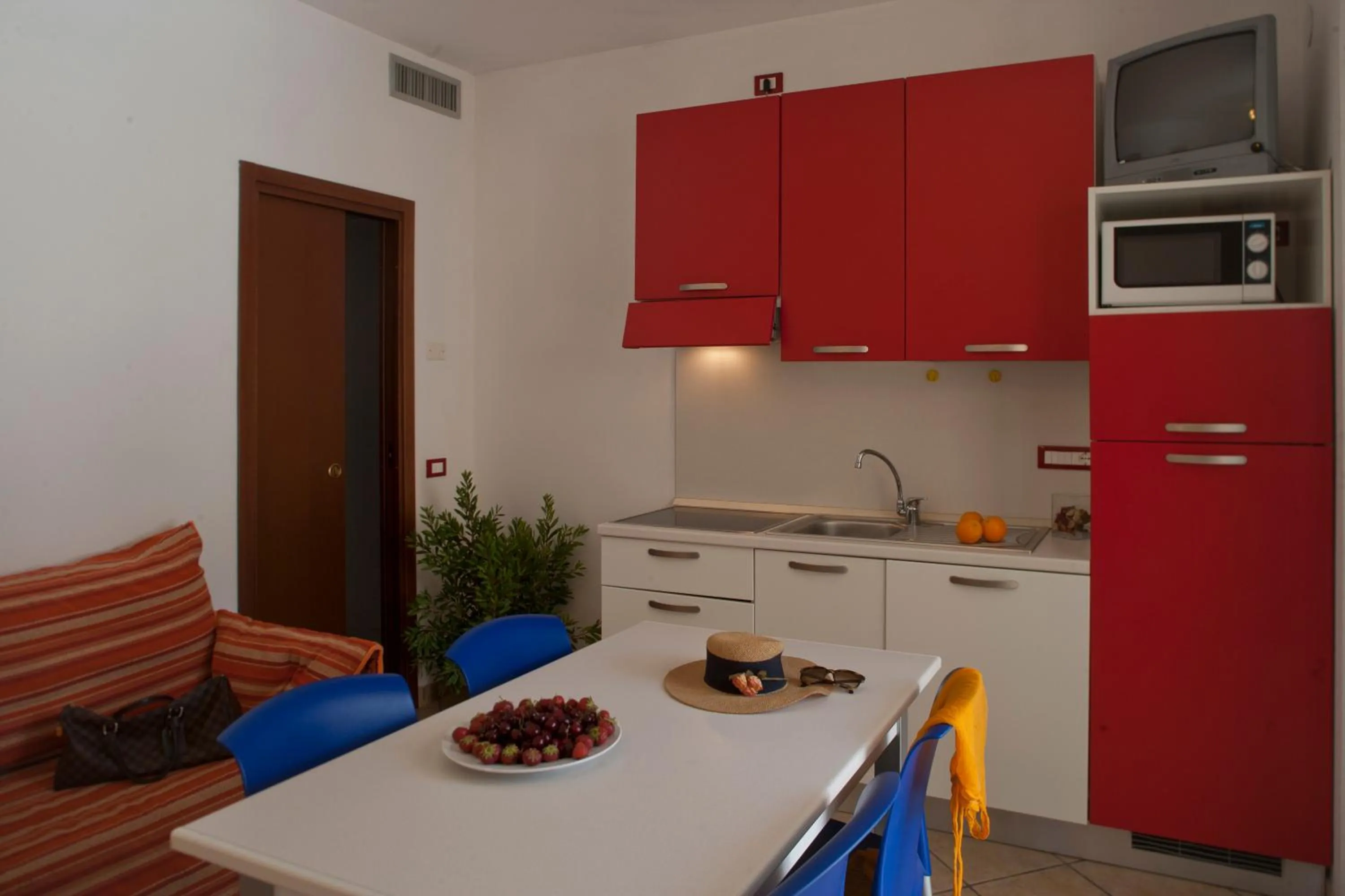 Kitchen or kitchenette in Michelangelo Holiday & Family Resort