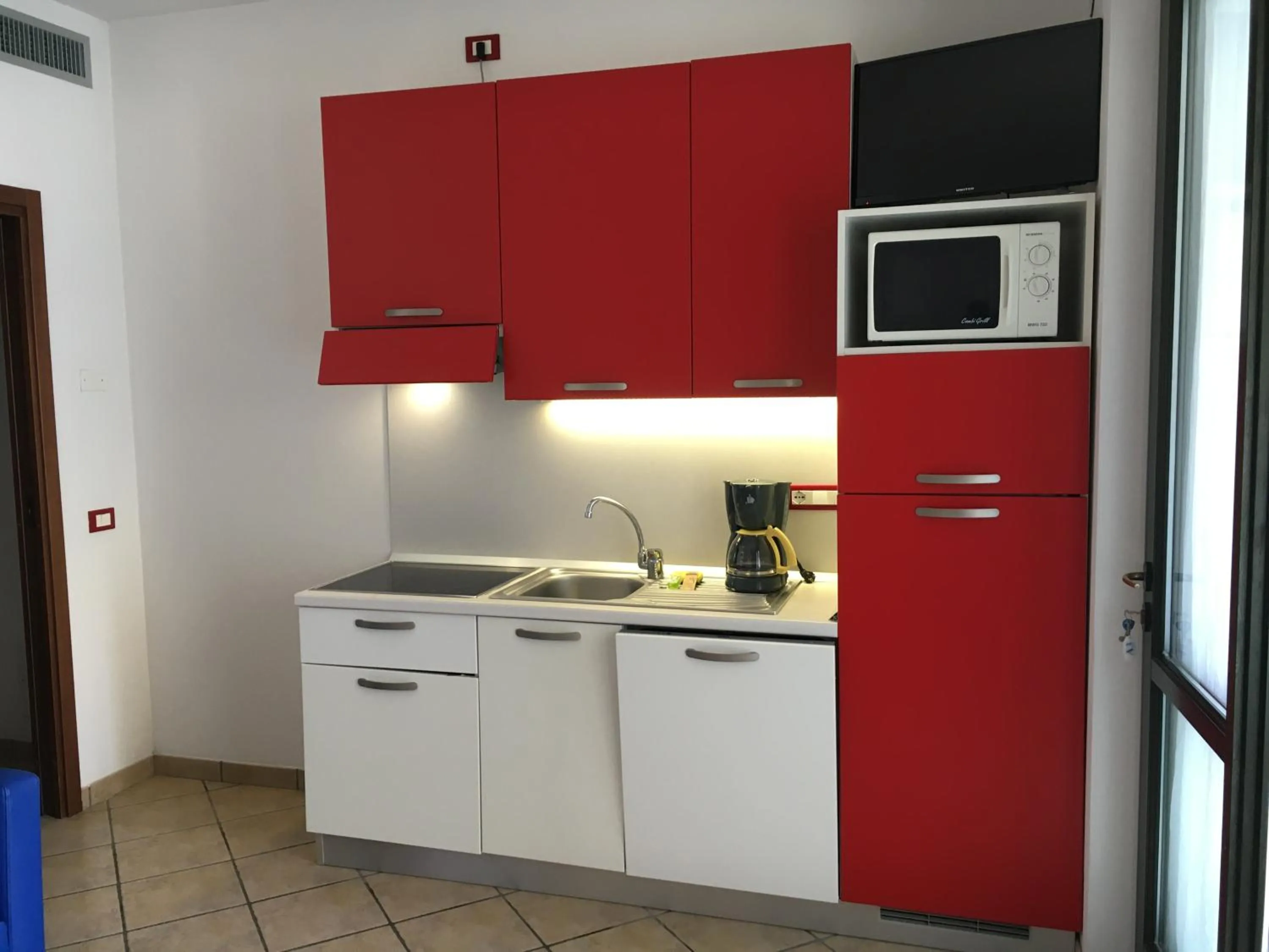 Kitchen or kitchenette in Michelangelo Holiday & Family Resort